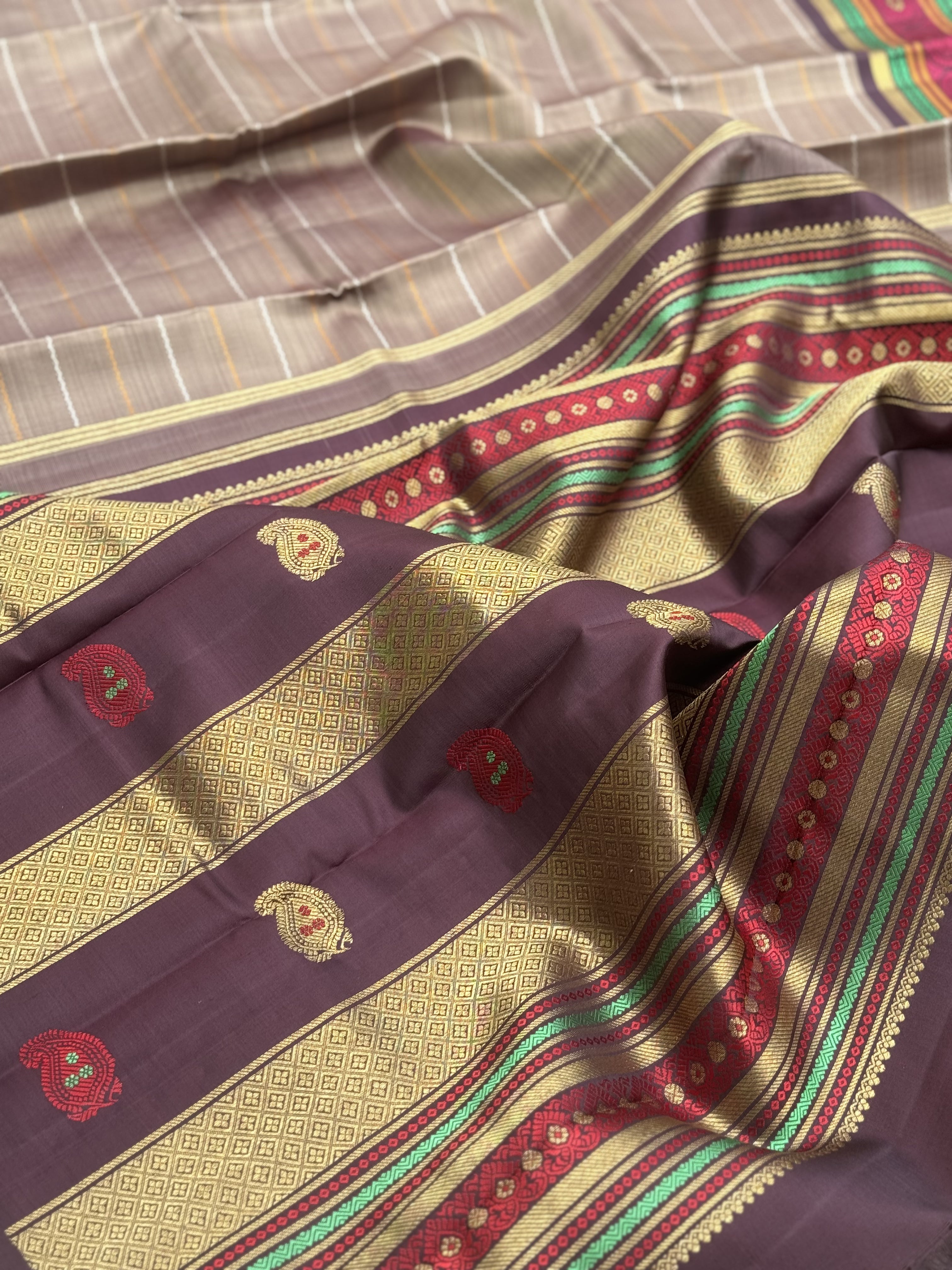 A Masterpiece neli veldhari kanchivaram korvai silk saree in a gorgeous molten gold shade