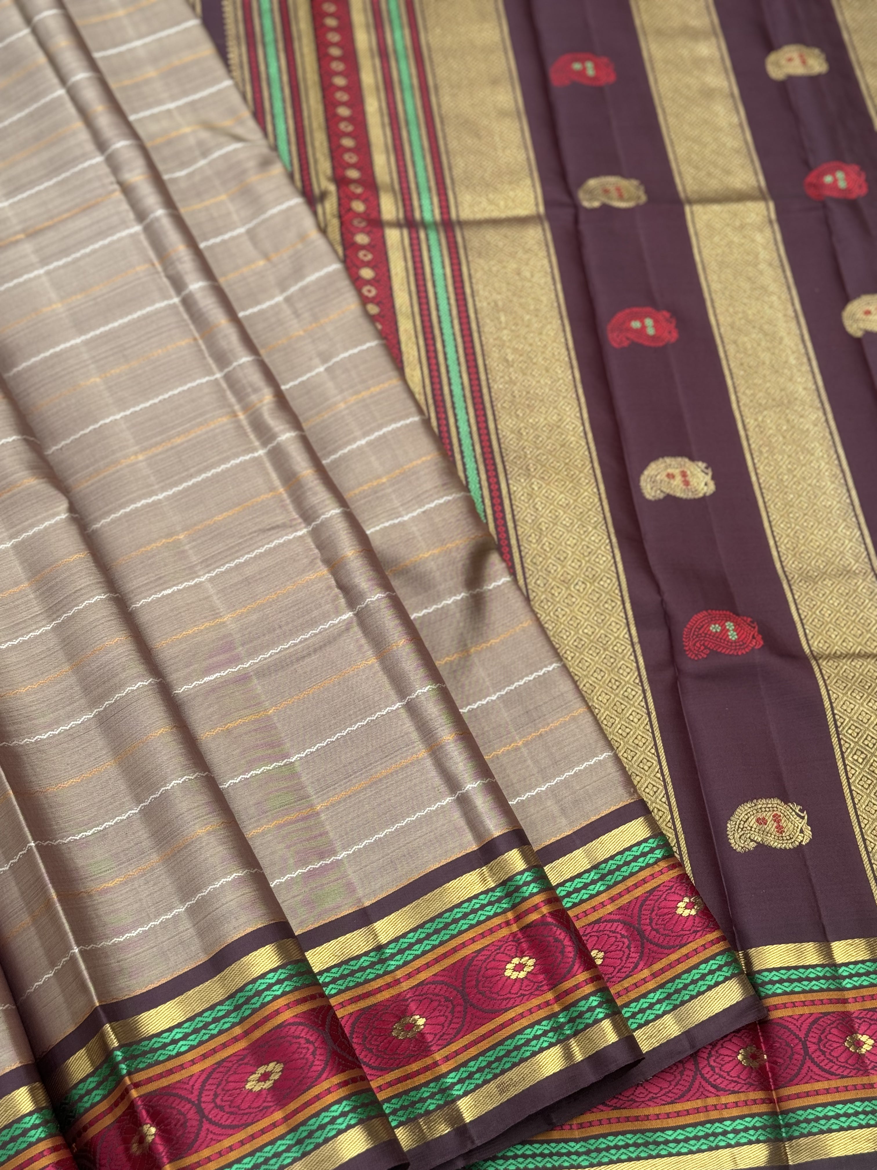 A Masterpiece neli veldhari kanchivaram korvai silk saree in a gorgeous molten gold shade