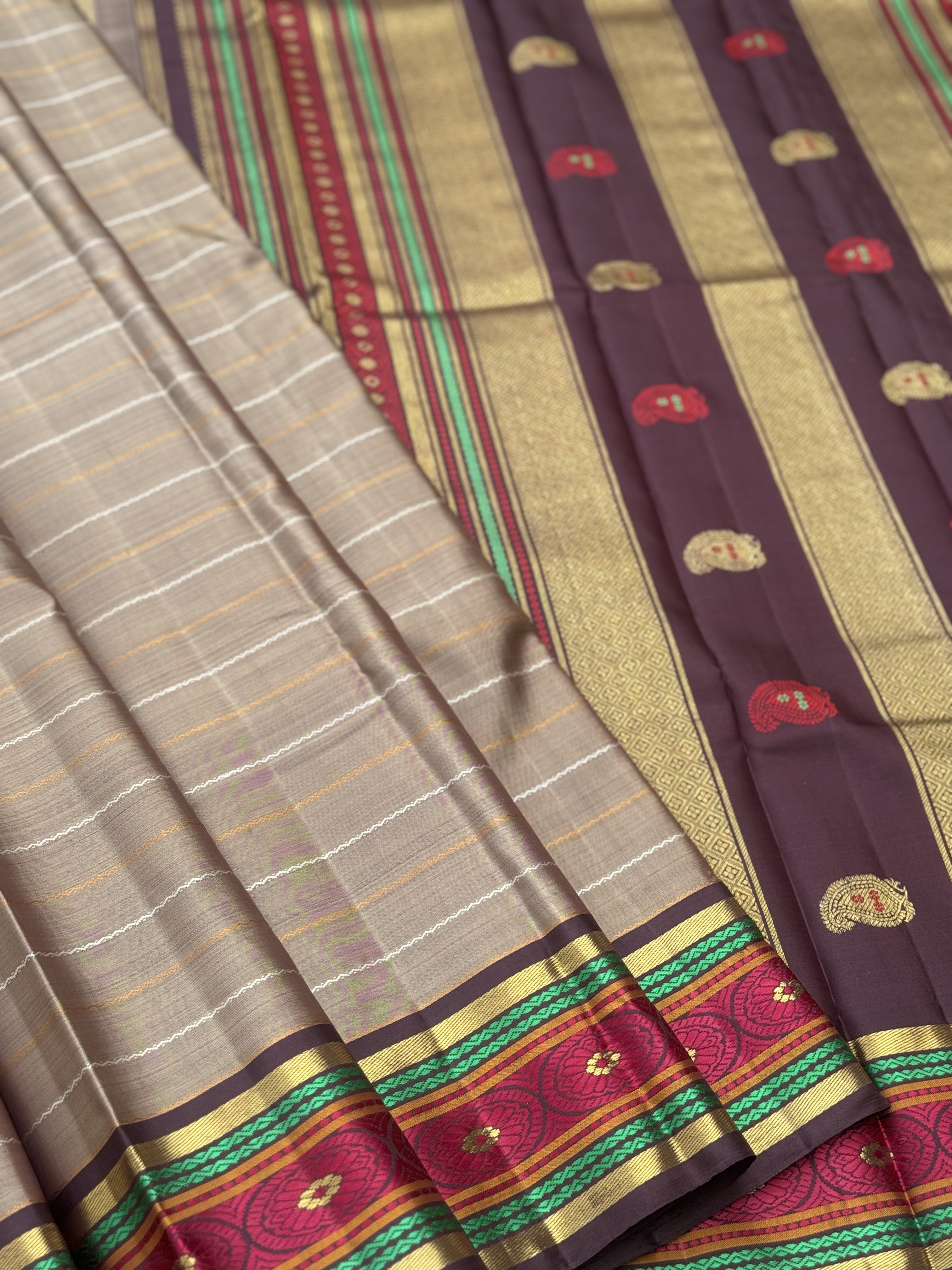 A Masterpiece neli veldhari kanchivaram korvai silk saree in a gorgeous molten gold shade