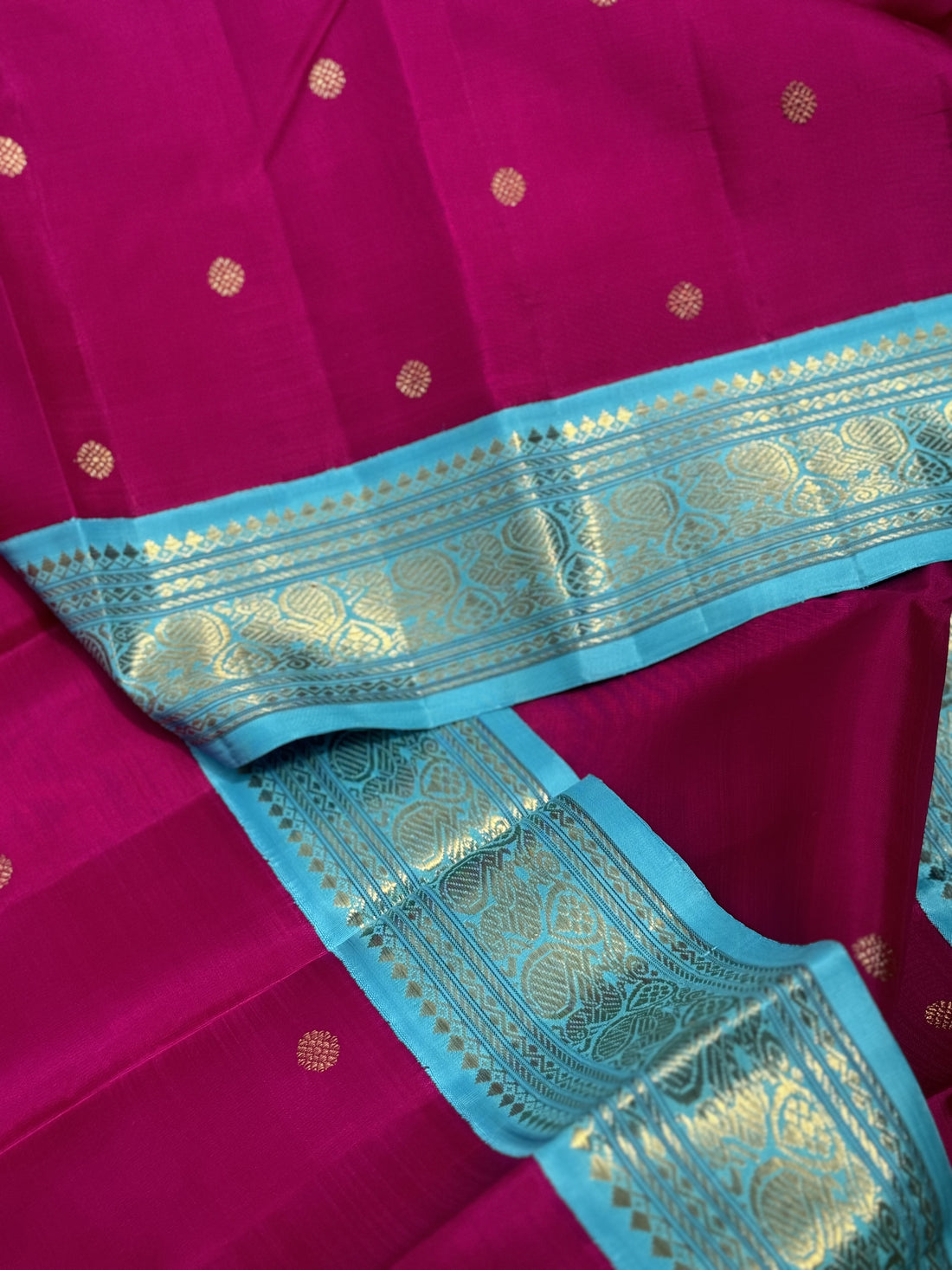 A Masterpiece kanchivaram korvai silk saree in deep amaranth pink with seablue