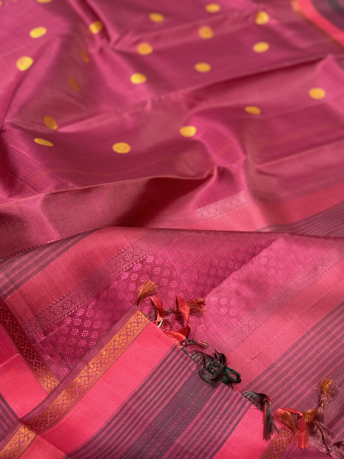A Masterpiece no zari kanchivaram silk saree in a gorgeous mauve pink with yellow