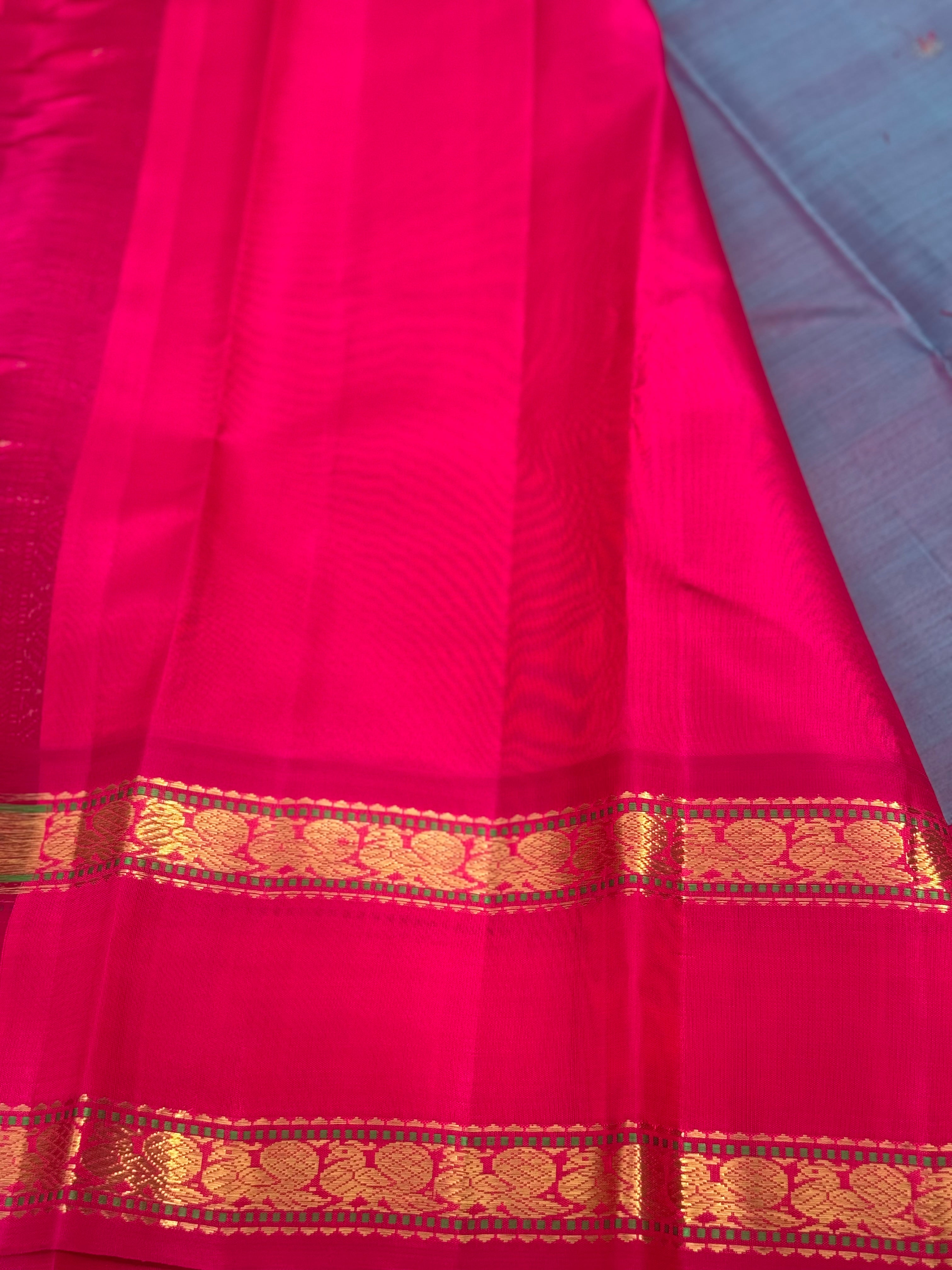 A Masterpiece kanchivaram korvai silk saree in peacock blue with pink