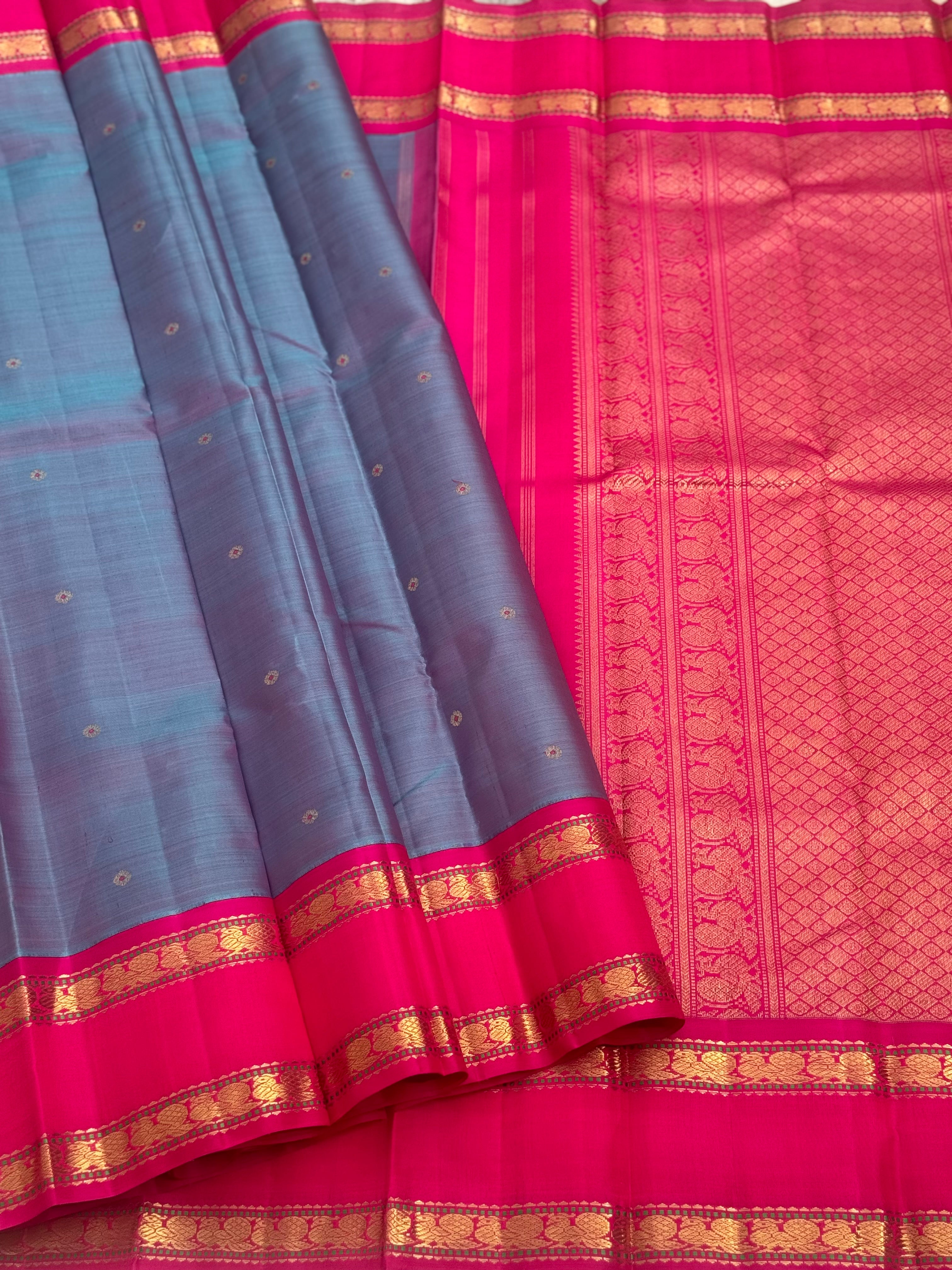 A Masterpiece kanchivaram korvai silk saree in peacock blue with pink
