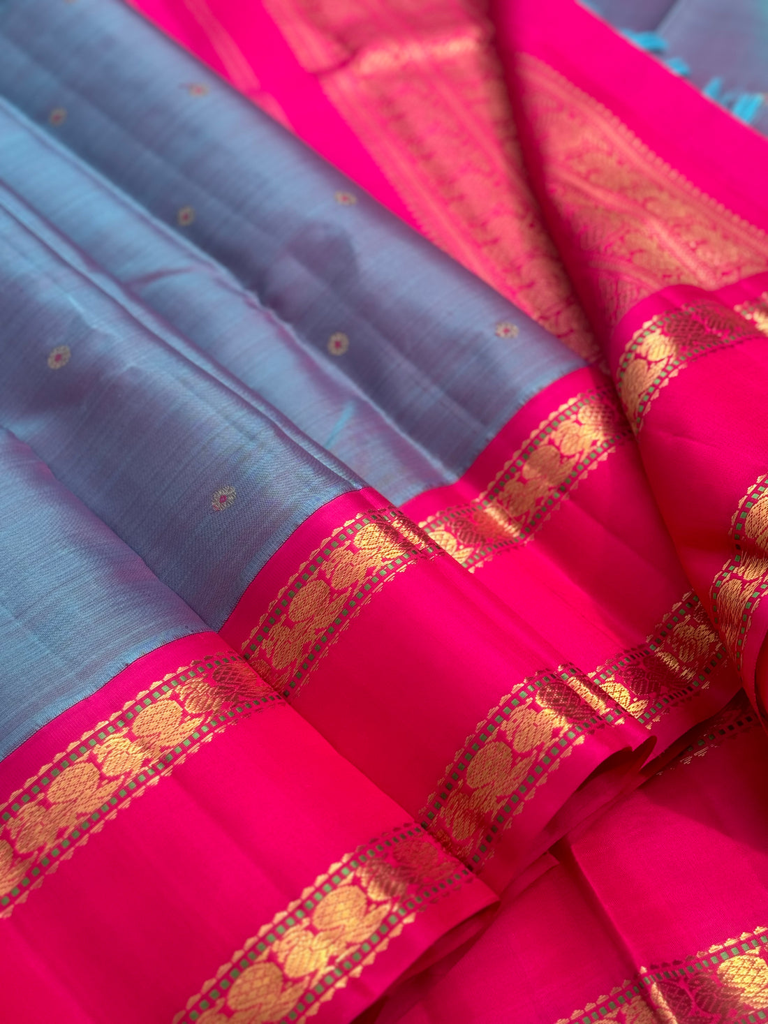 A Masterpiece kanchivaram korvai silk saree in peacock blue with pink