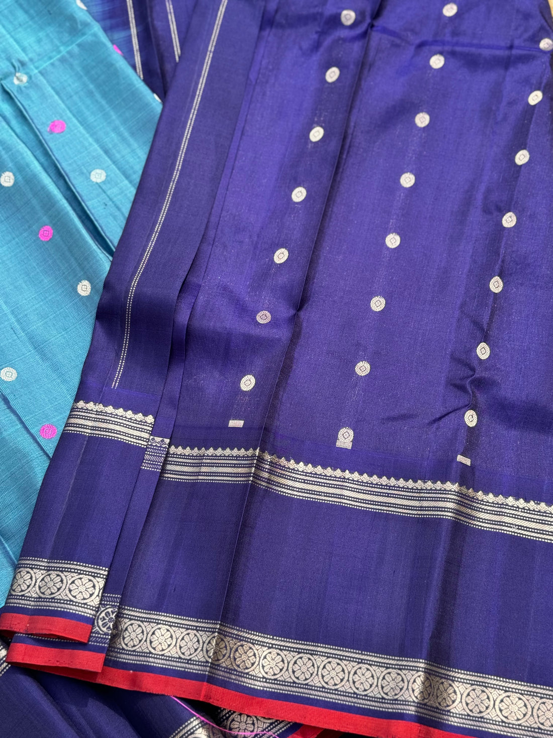 A gorgeous peacock teal handwoven gadwal silk saree