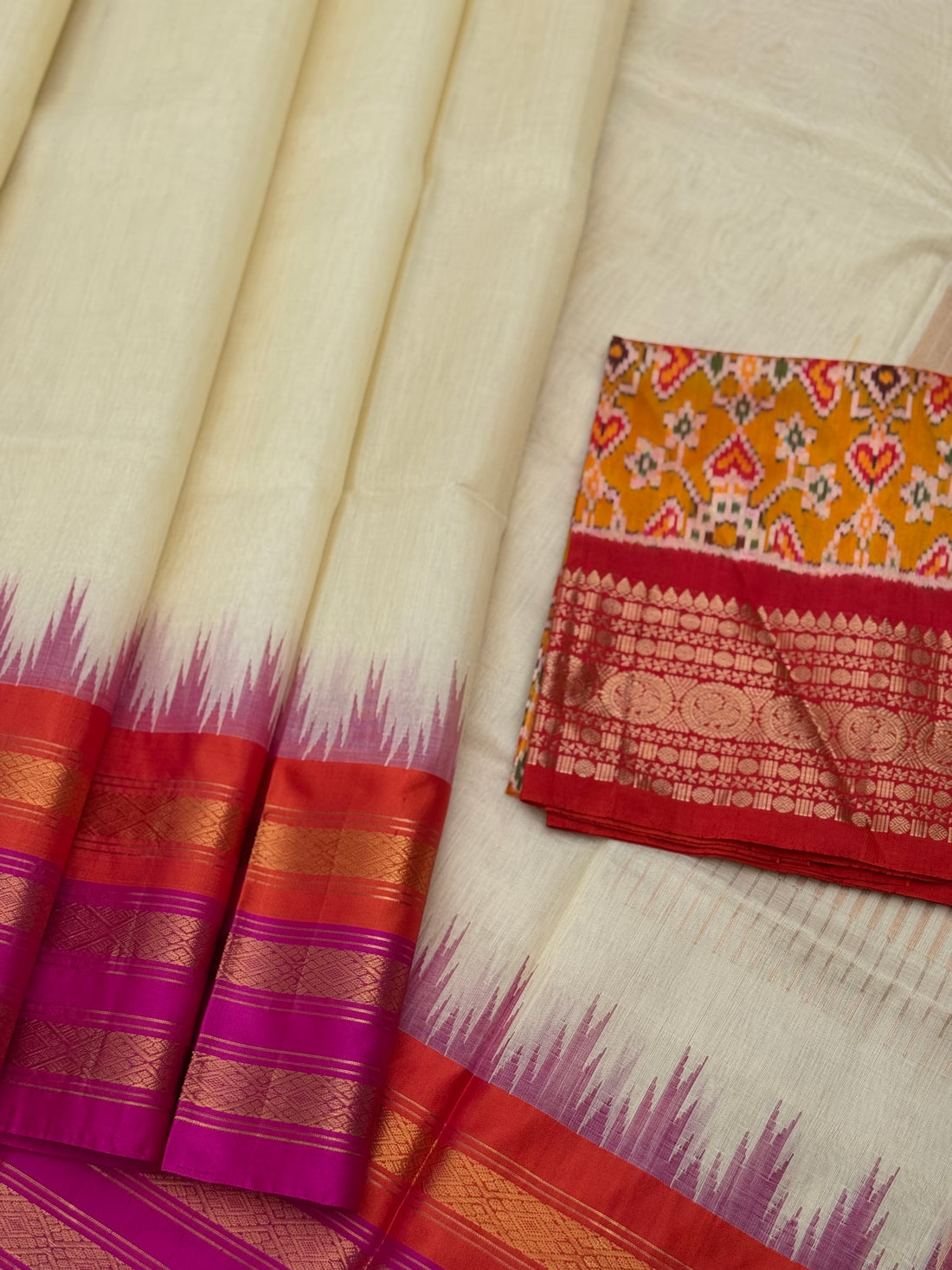 Handspun and handwoven ponduru Khadhi silk saree with silk border in contrast orange pink
