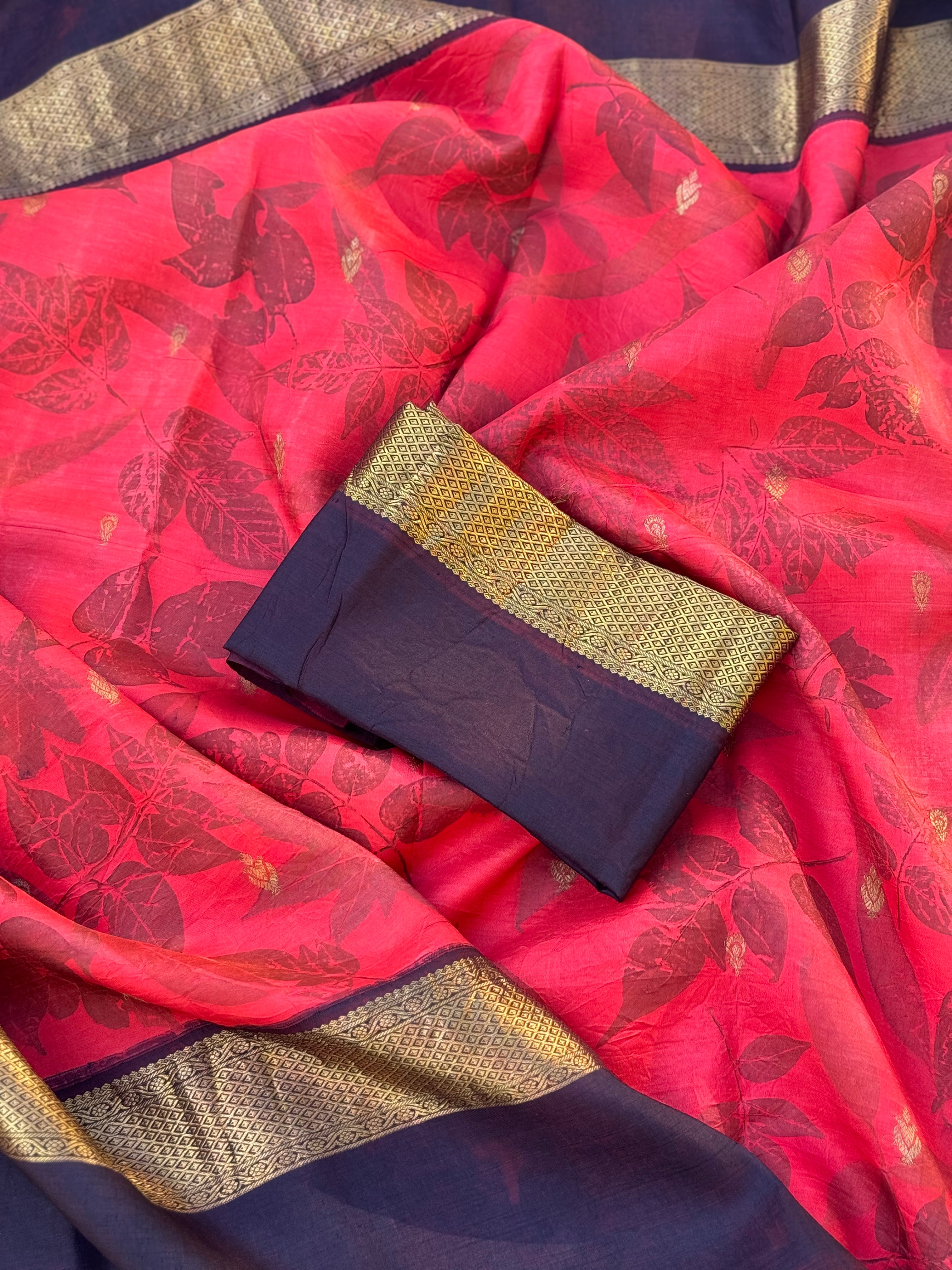 A stunningly gorgeous tomato red korvai kanchivaram silk saree with Ecoprints