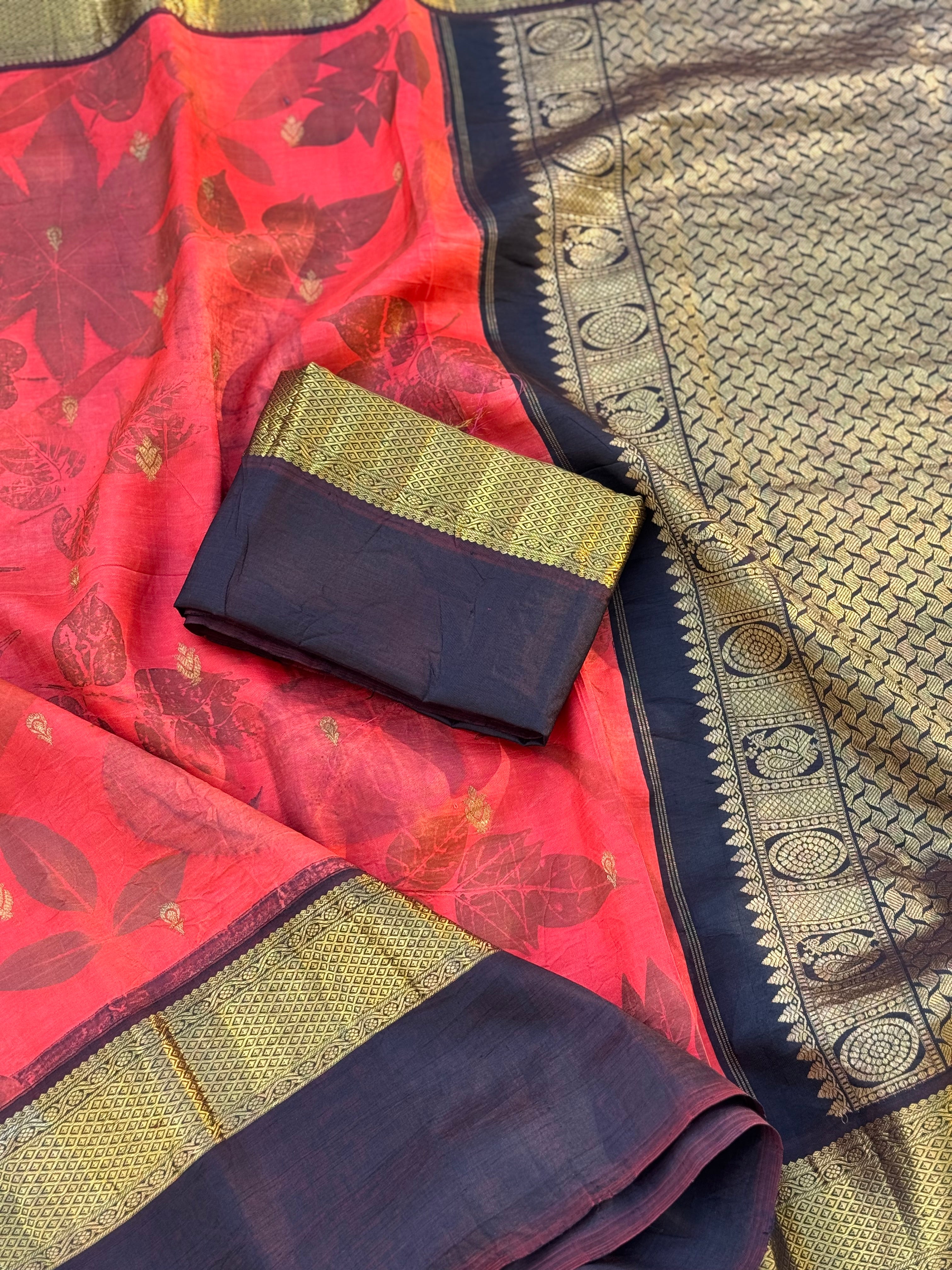 A stunningly gorgeous tomato red korvai kanchivaram silk saree with Ecoprints