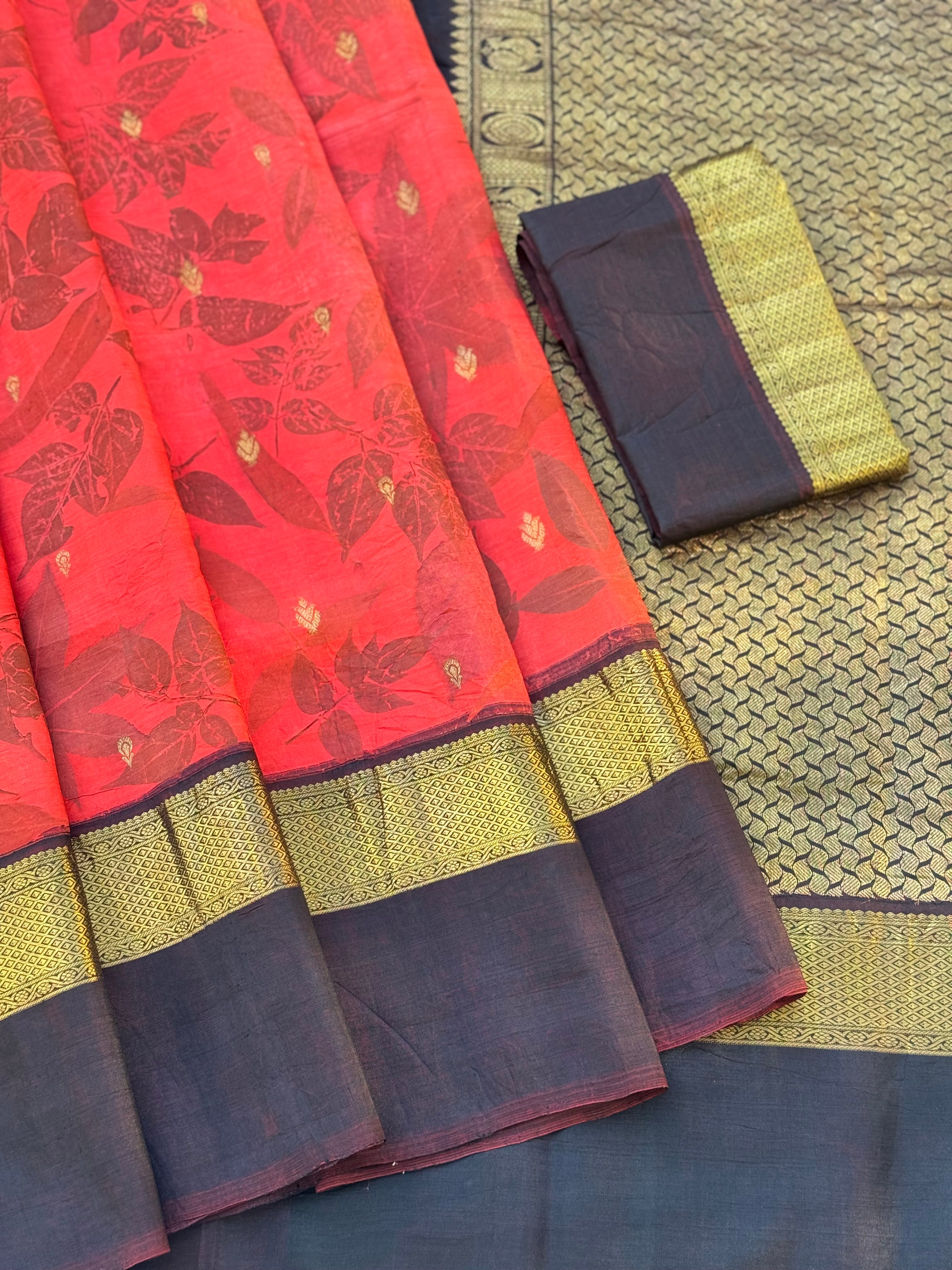 A stunningly gorgeous tomato red korvai kanchivaram silk saree with Ecoprints