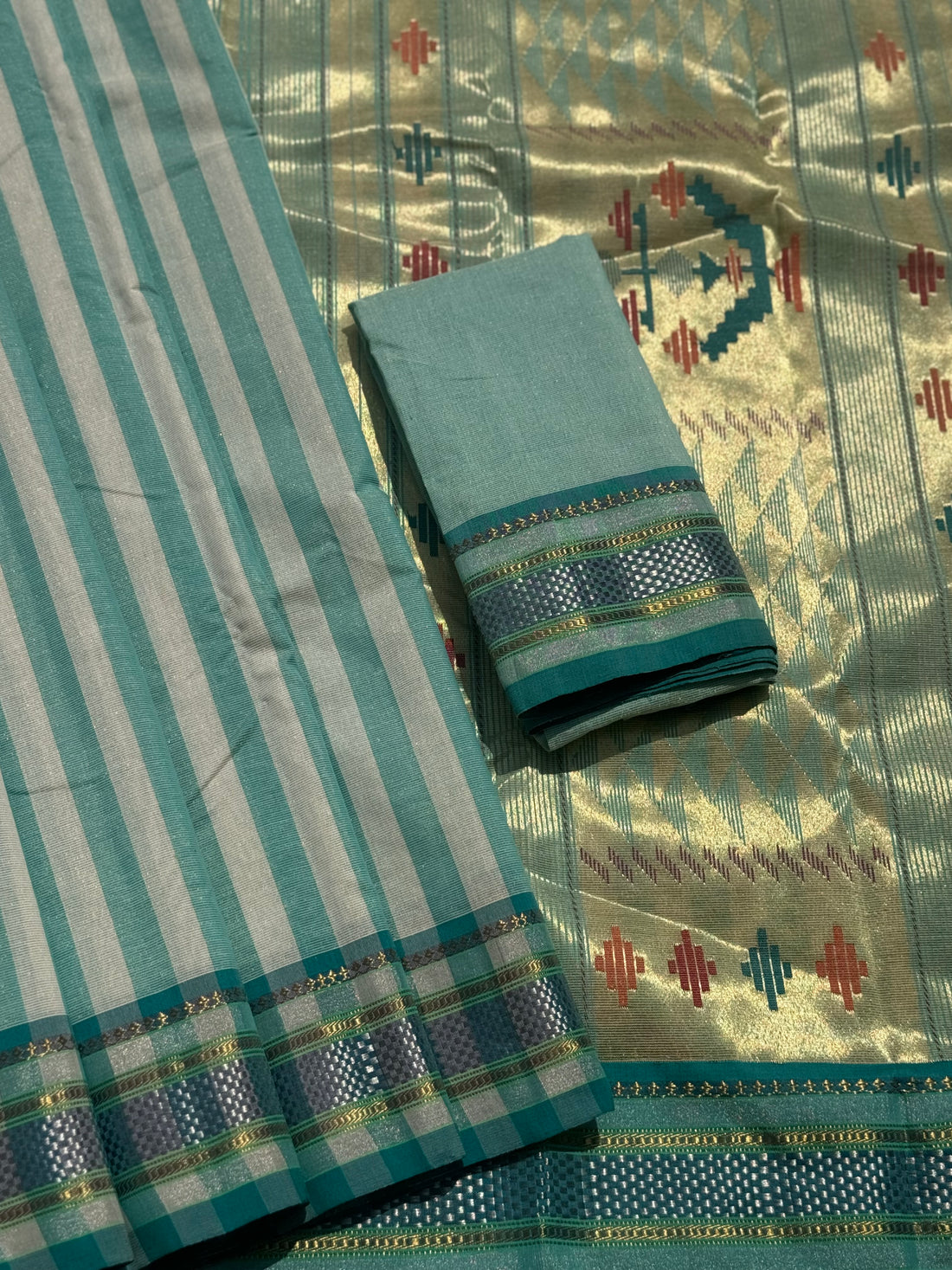 Turquoise Blue Paithani Cotton Saree With Zaristripes Body Tissue Paithani Pallu Kadiyal Border Saree