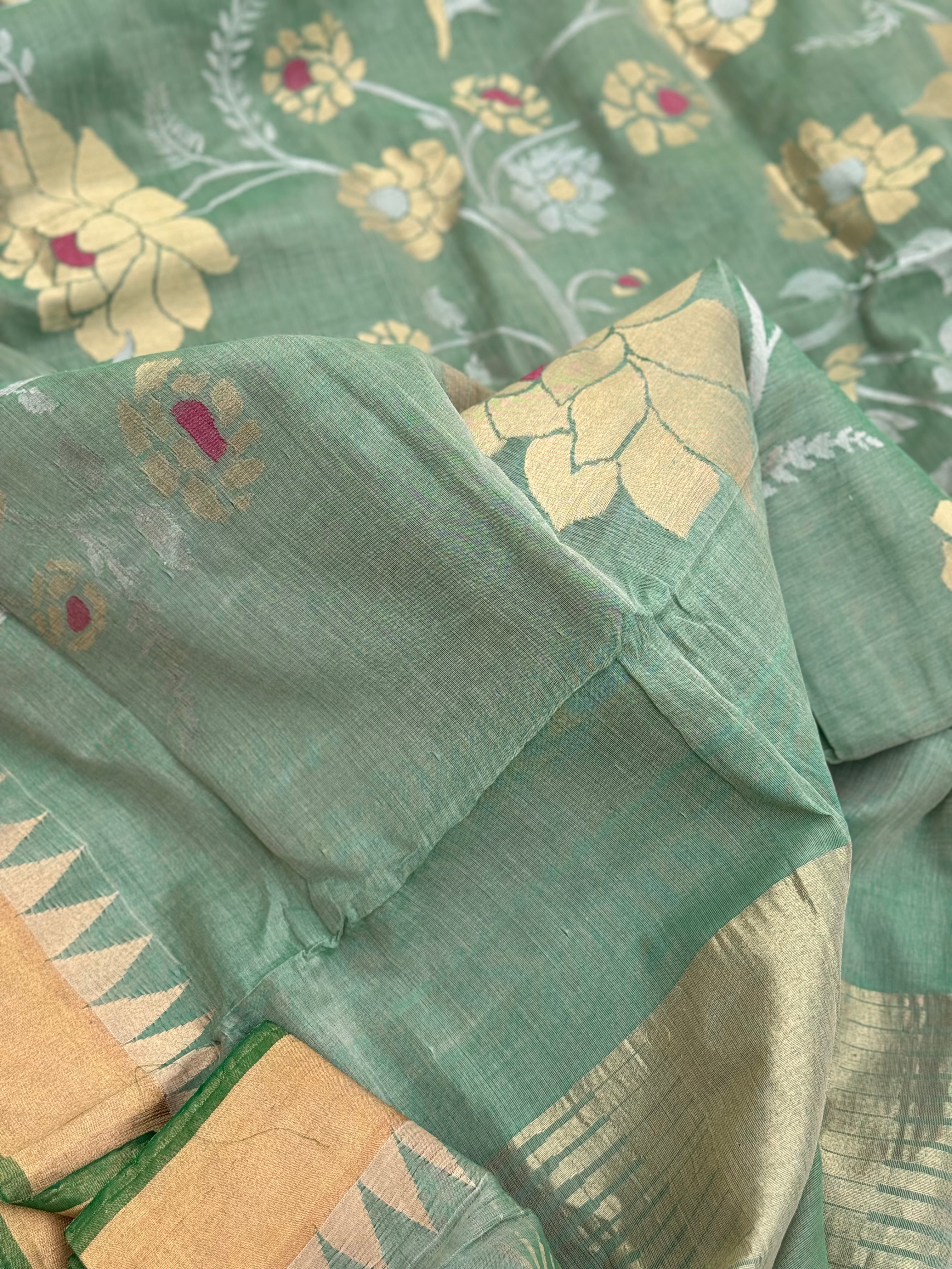 A gorgeous handspun ponduru Khadhi jamdani cotton saree in pastel green