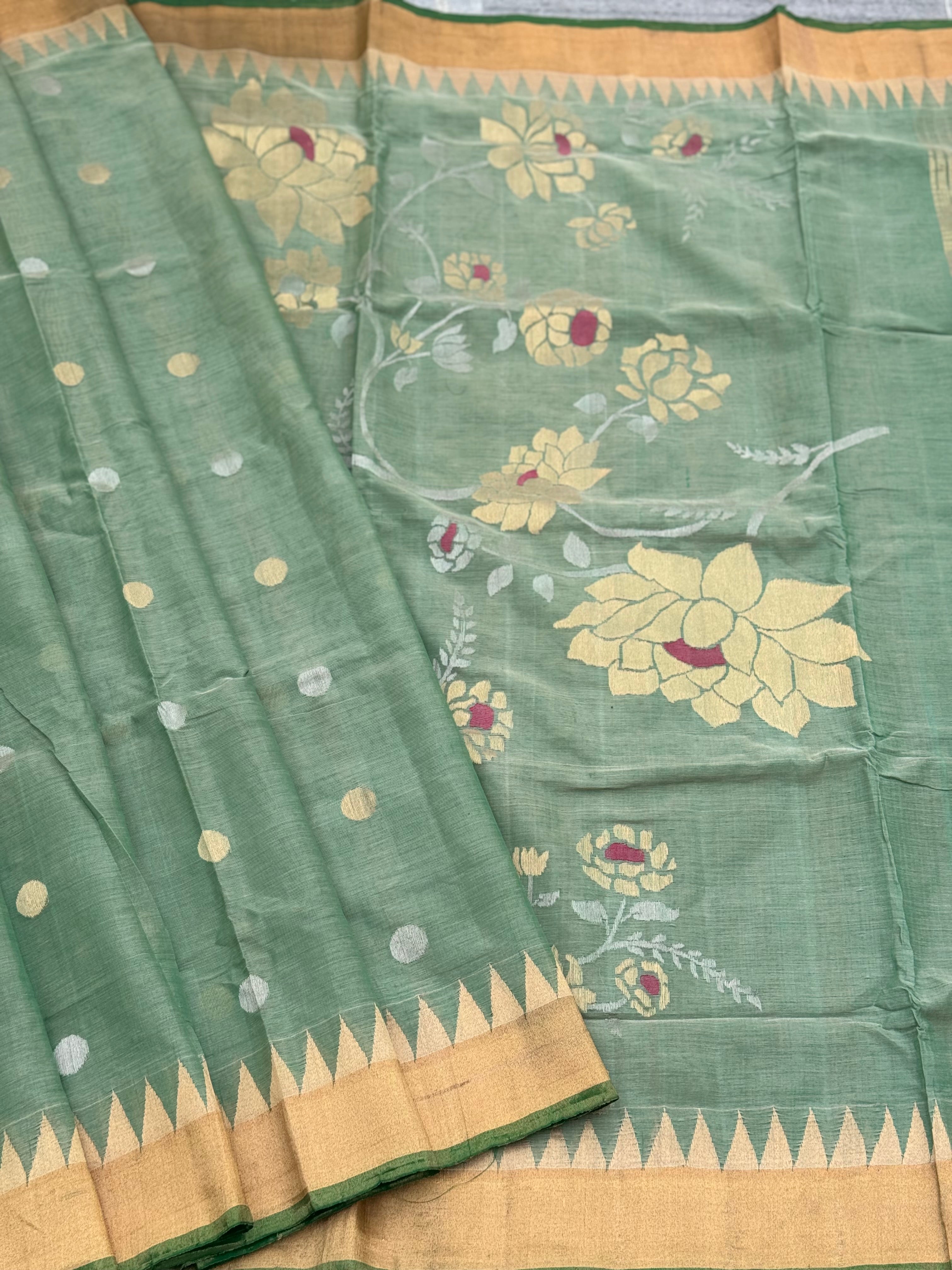 A gorgeous handspun ponduru Khadhi jamdani cotton saree in pastel green