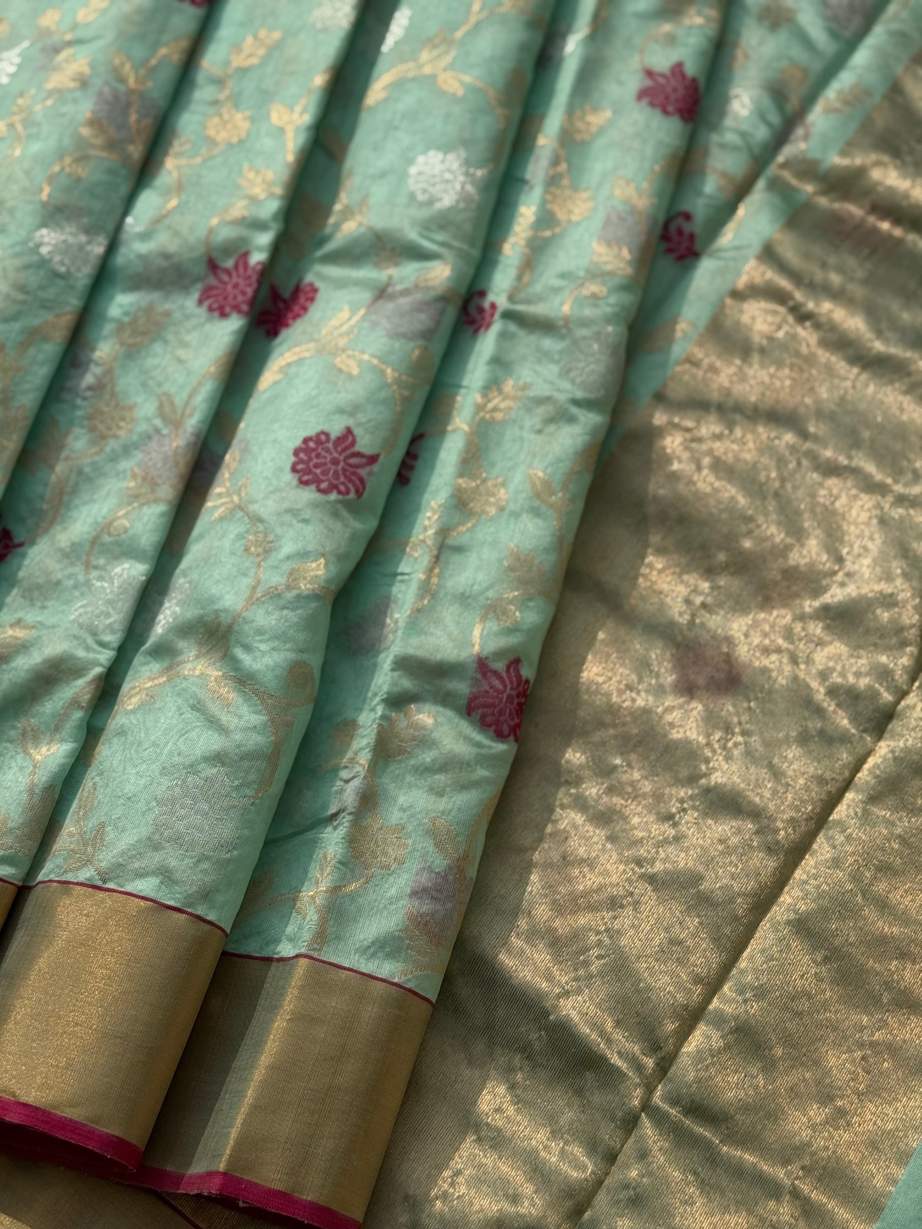 A foam green handwoven chanderi silk saree with full jaal weave ek naal and meenakari