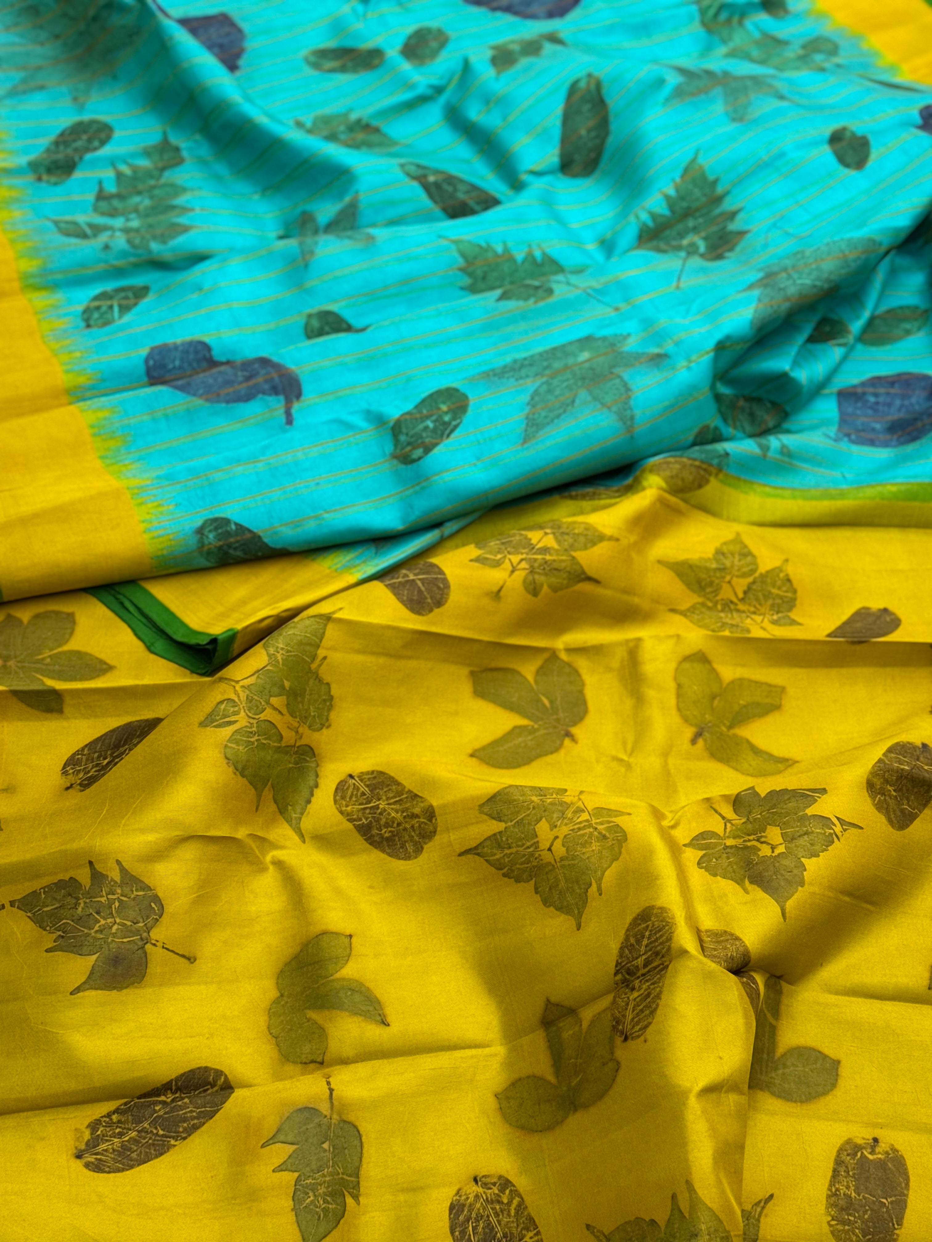 A gorgeous natural ecoprints done on foam blue with yellow kuttu gadwal silk saree