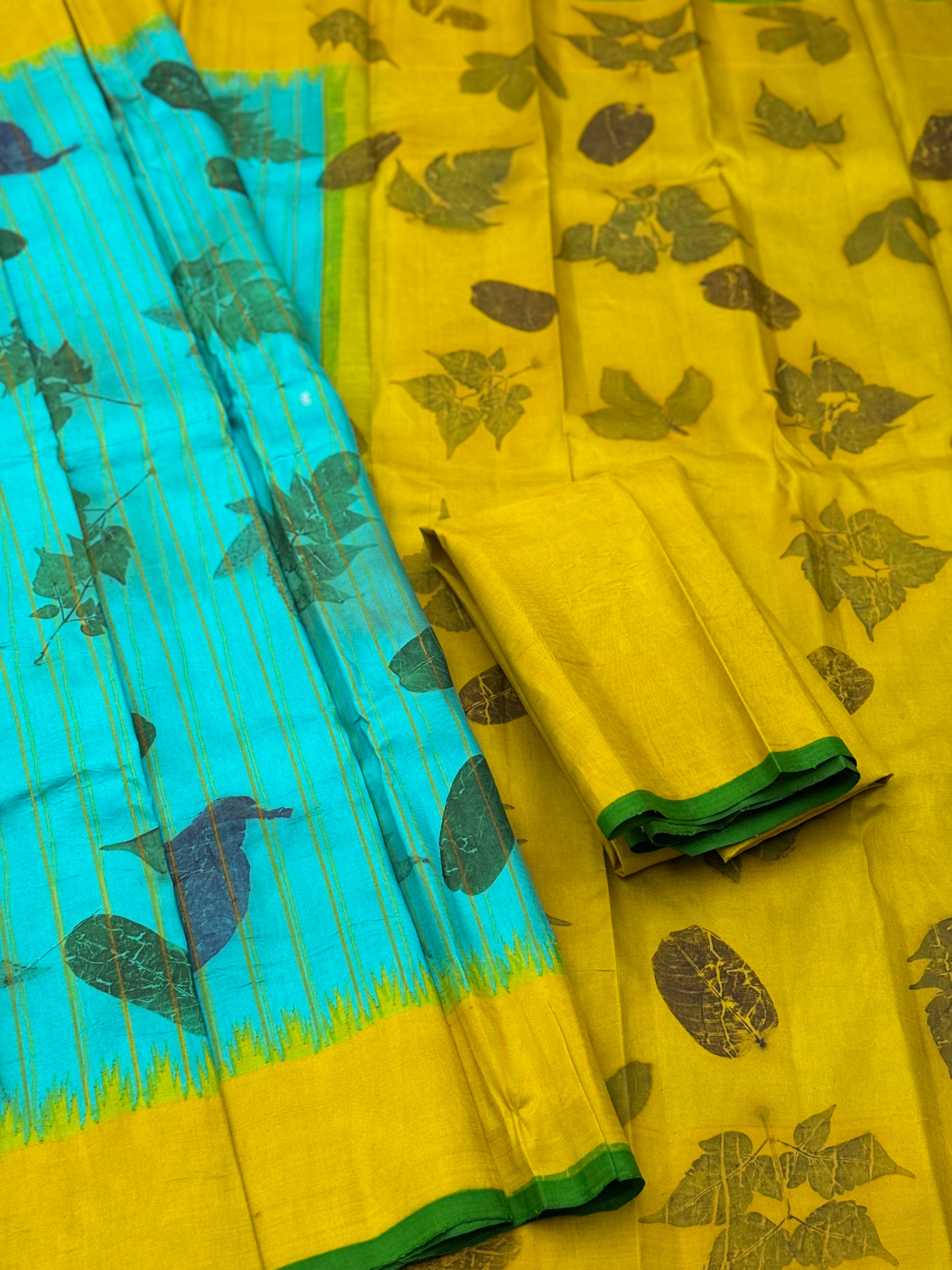 A gorgeous natural ecoprints done on foam blue with yellow kuttu gadwal silk saree