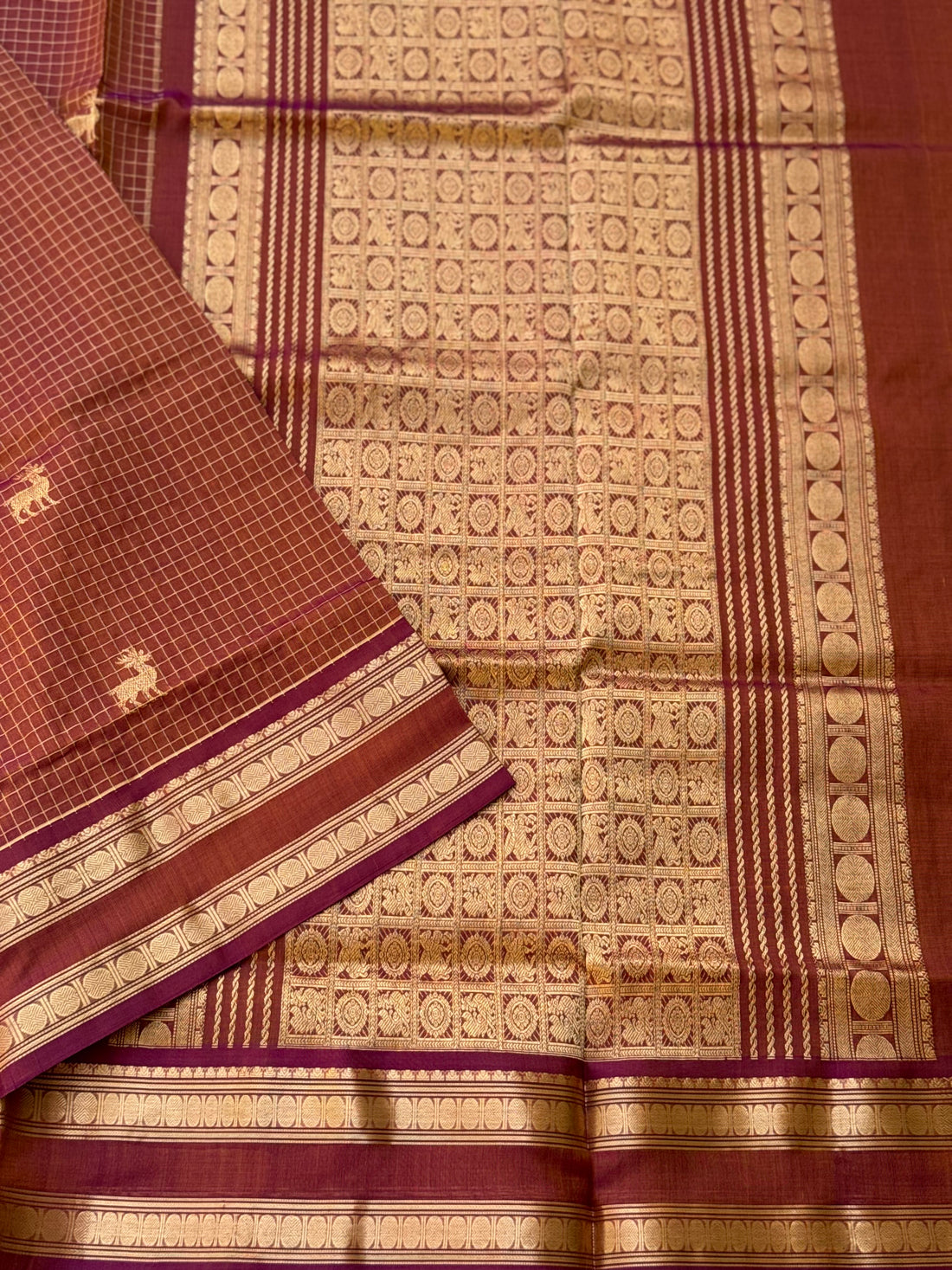 A gorgeous rust brown shade handwoven zari stripes kanchi silk cotton saree