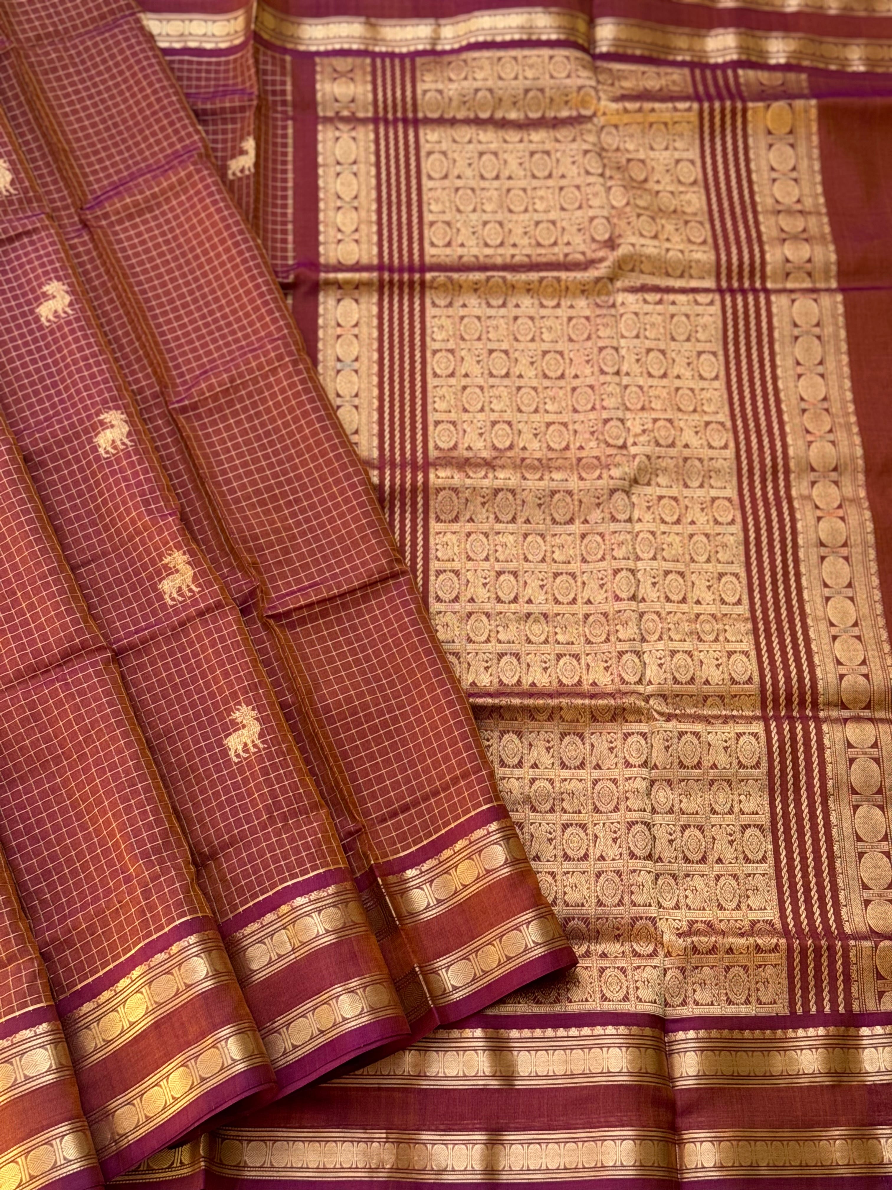 A gorgeous rust brown shade handwoven zari stripes kanchi silk cotton saree