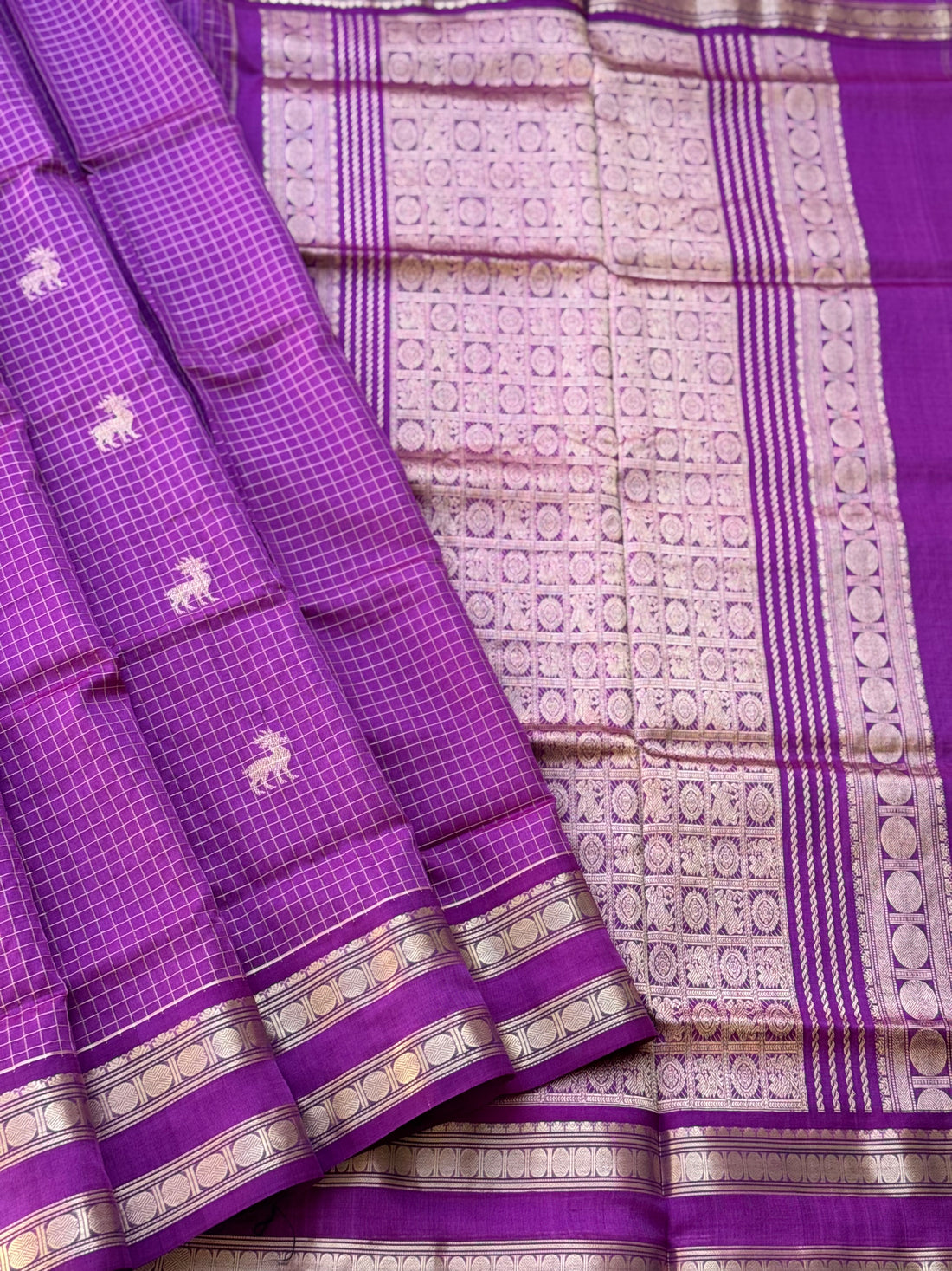 A gorgeous lilac shade handwoven zari stripes kanchi silk cotton saree