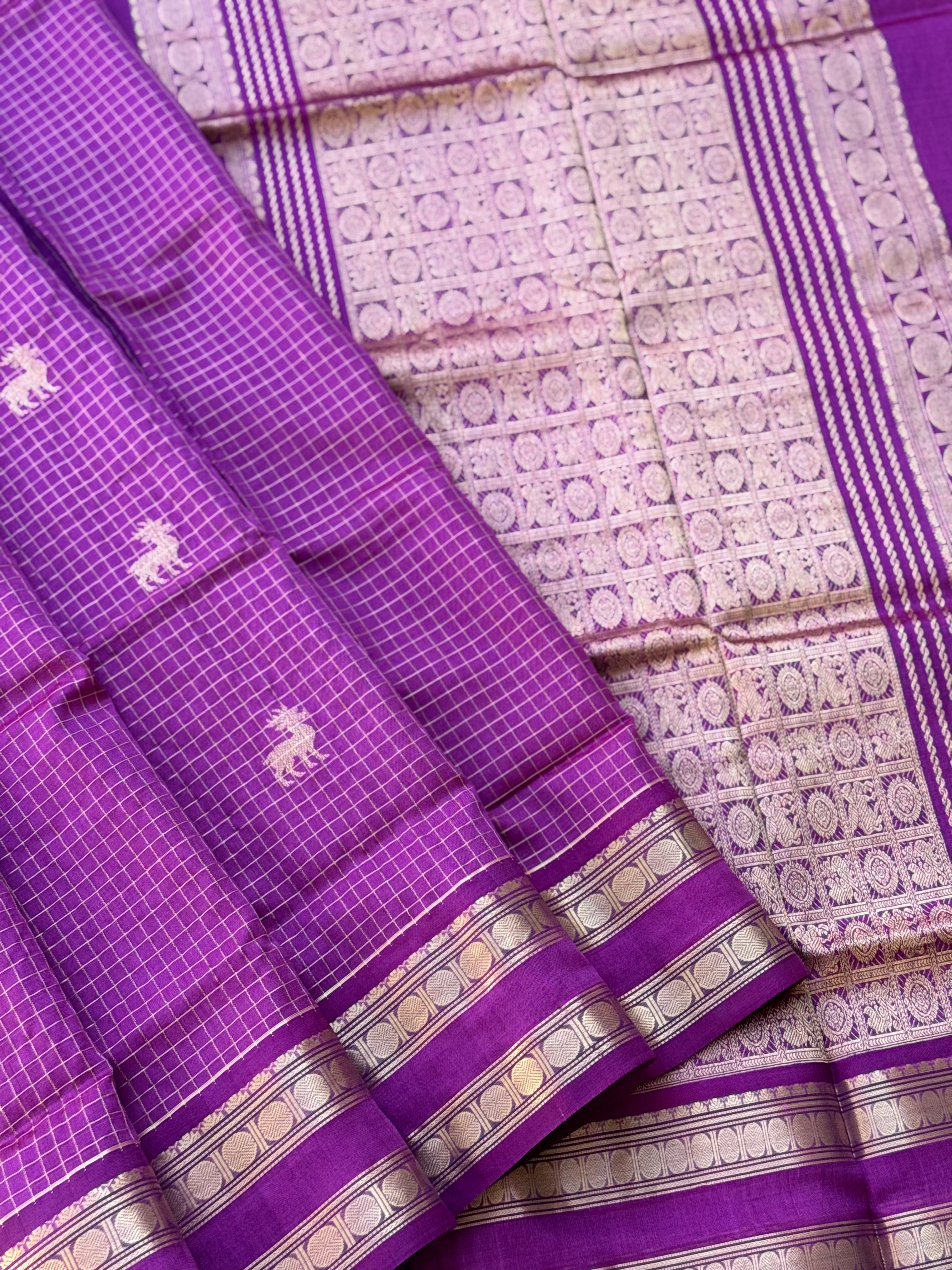 A gorgeous lilac shade handwoven zari stripes kanchi silk cotton saree