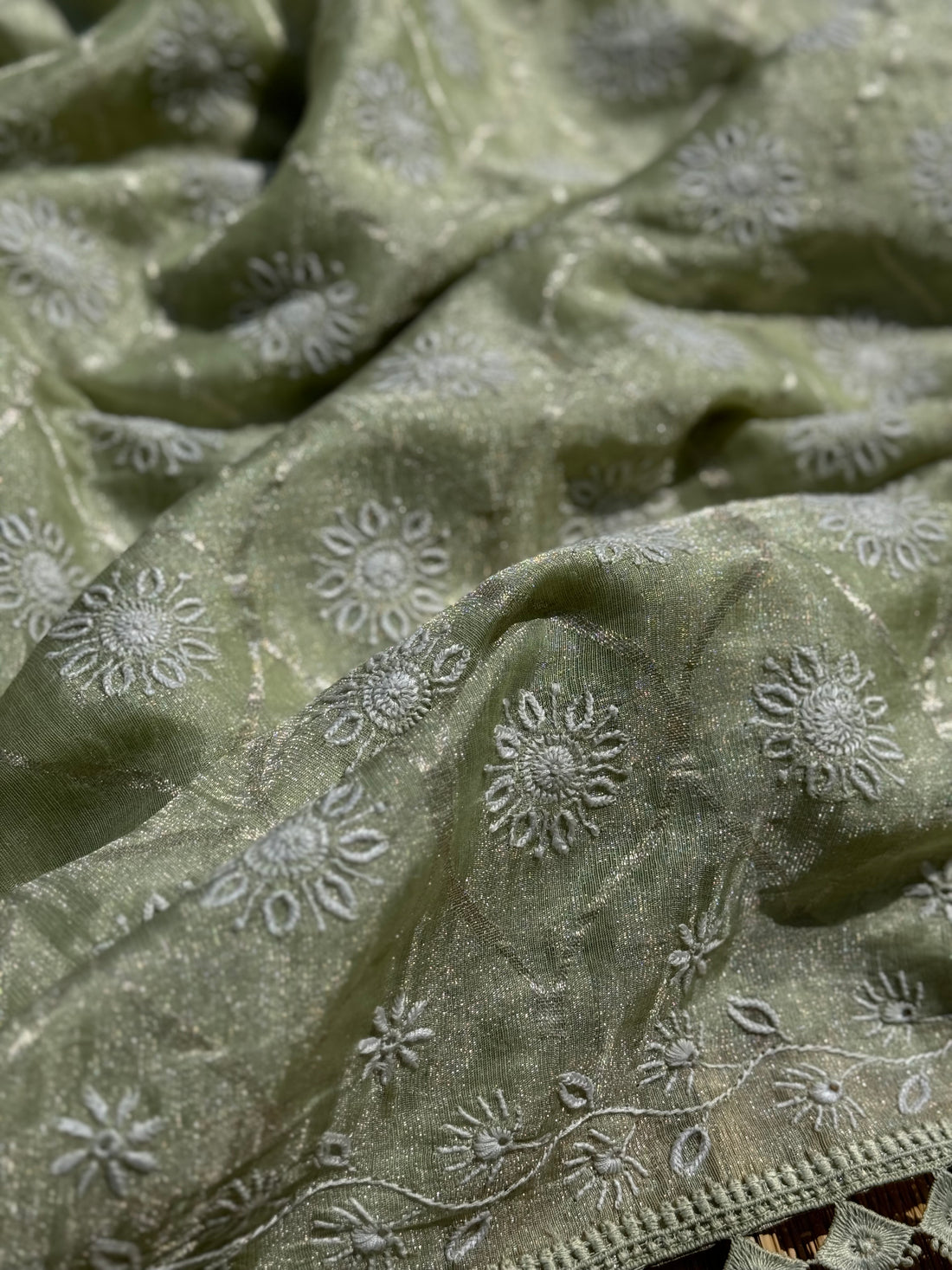 A stunner exclusive designer collective Matcha green all over Chikankari work on handwoven tissue silk