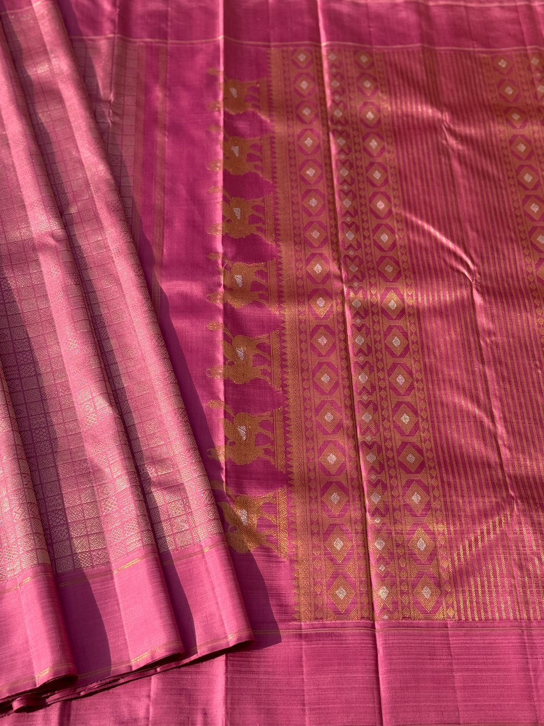 A Canvas of Legendary Artistry The Masterpiece 108 exquisite Kanchivaram silk showcases kamadenu pallu in hot pink hue of the finest and rarest natural dye