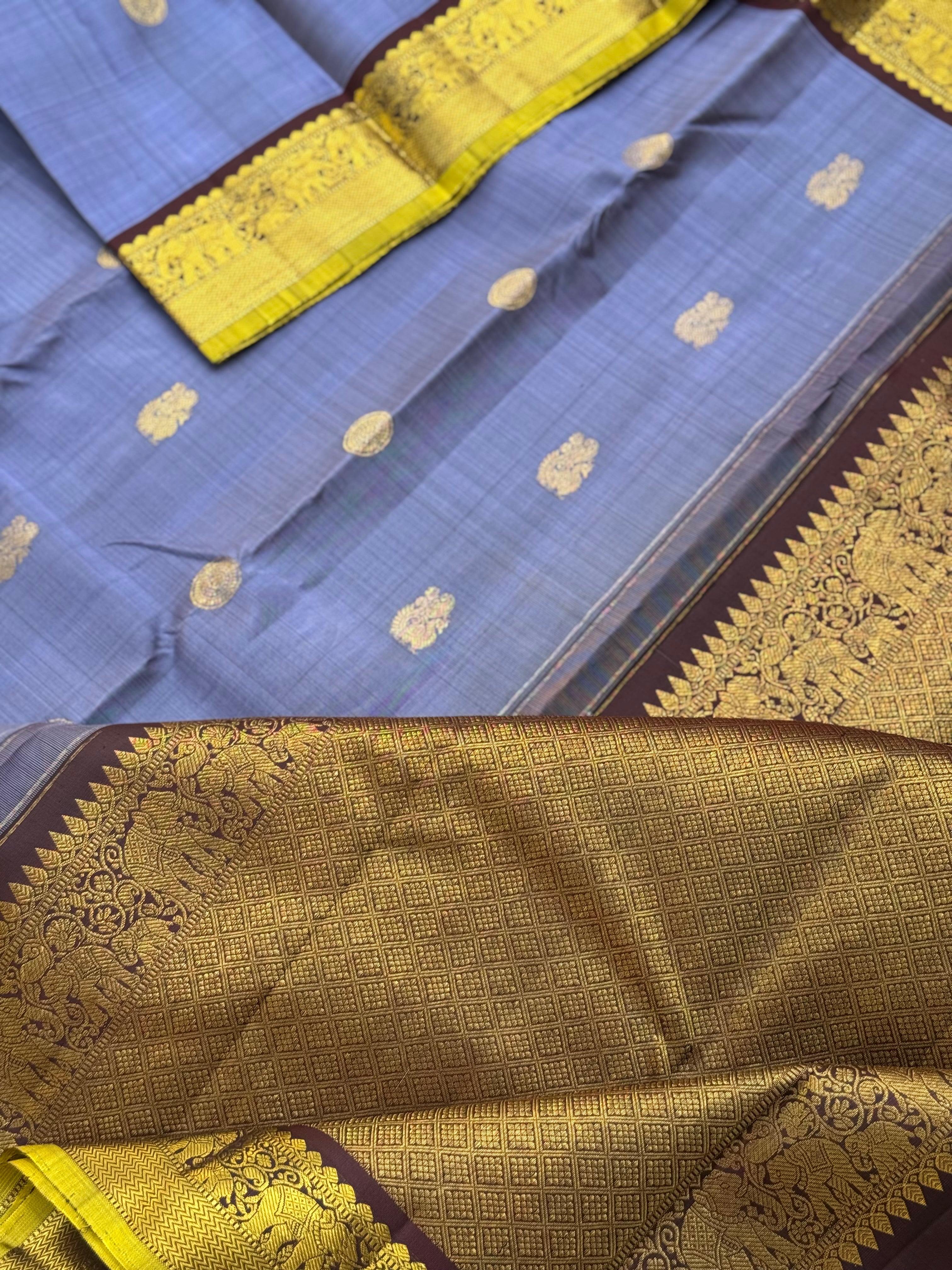 A stunner metallic powder blue korvai kanchivaram kanchivaram silk saree with annam chakkaram