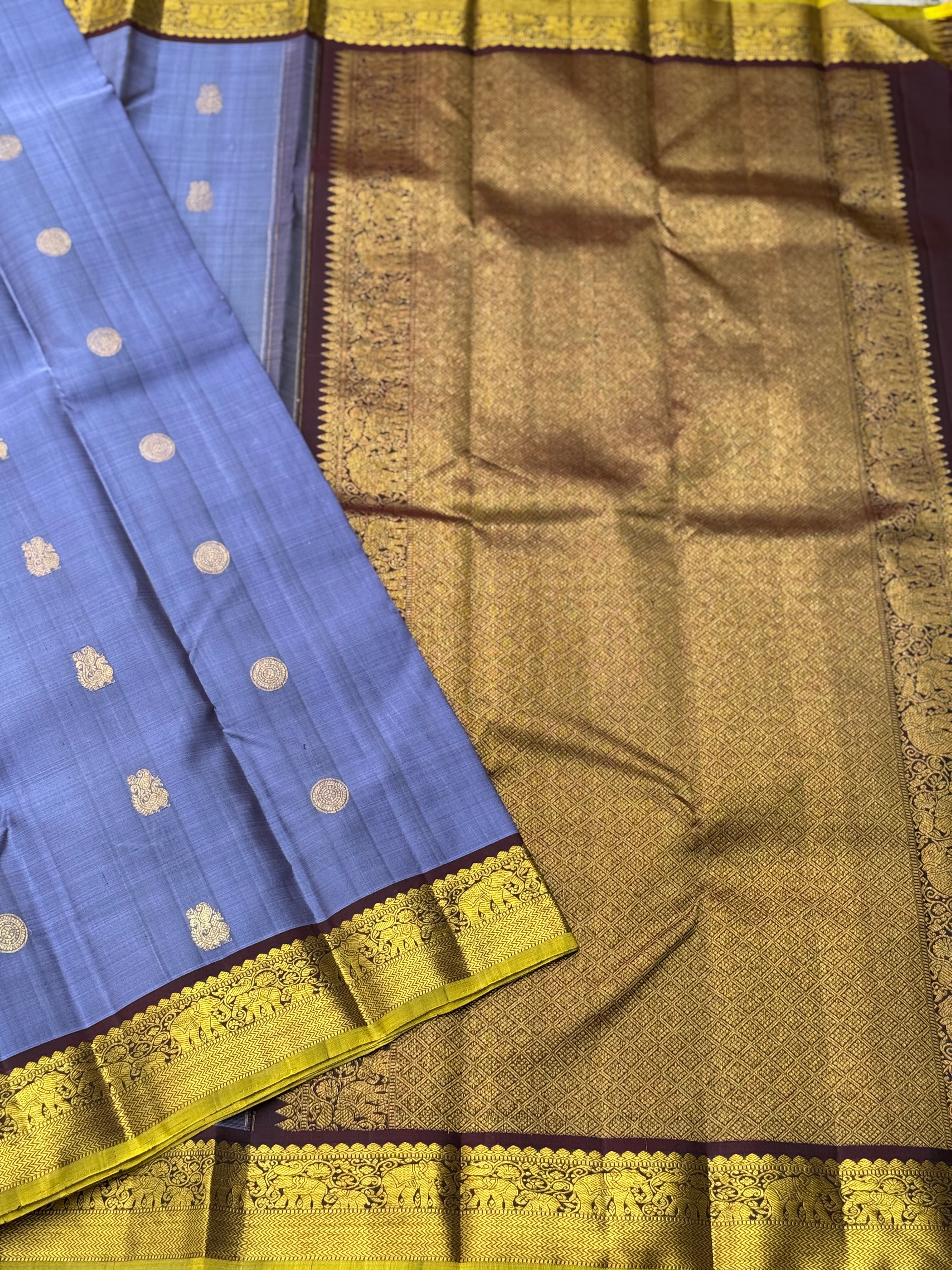 A stunner metallic powder blue korvai kanchivaram kanchivaram silk saree with annam chakkaram