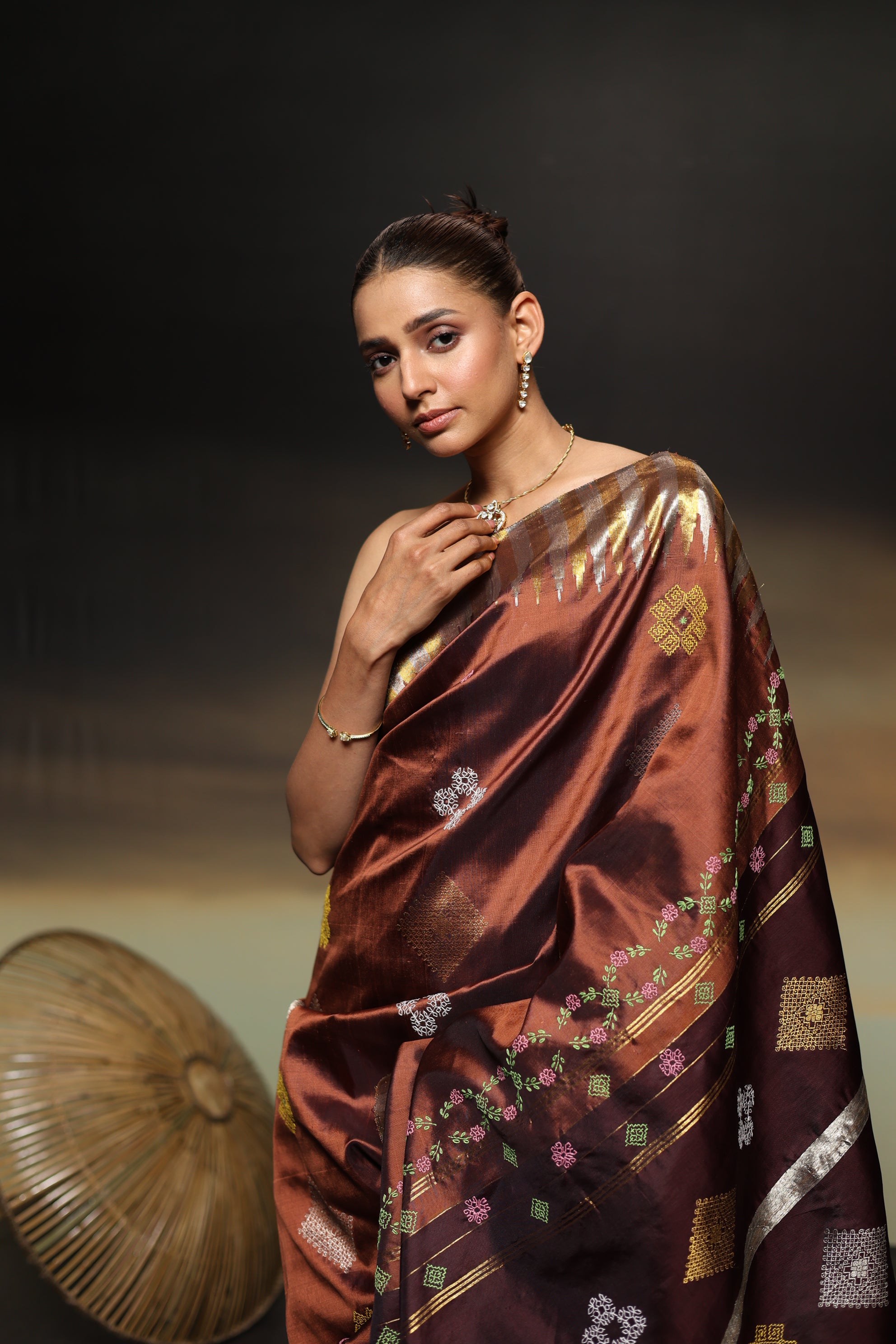 A designer exclusive Choco brown and caramel brown shade ettukol kanchivaram silk saree with kasuti hand embroidery