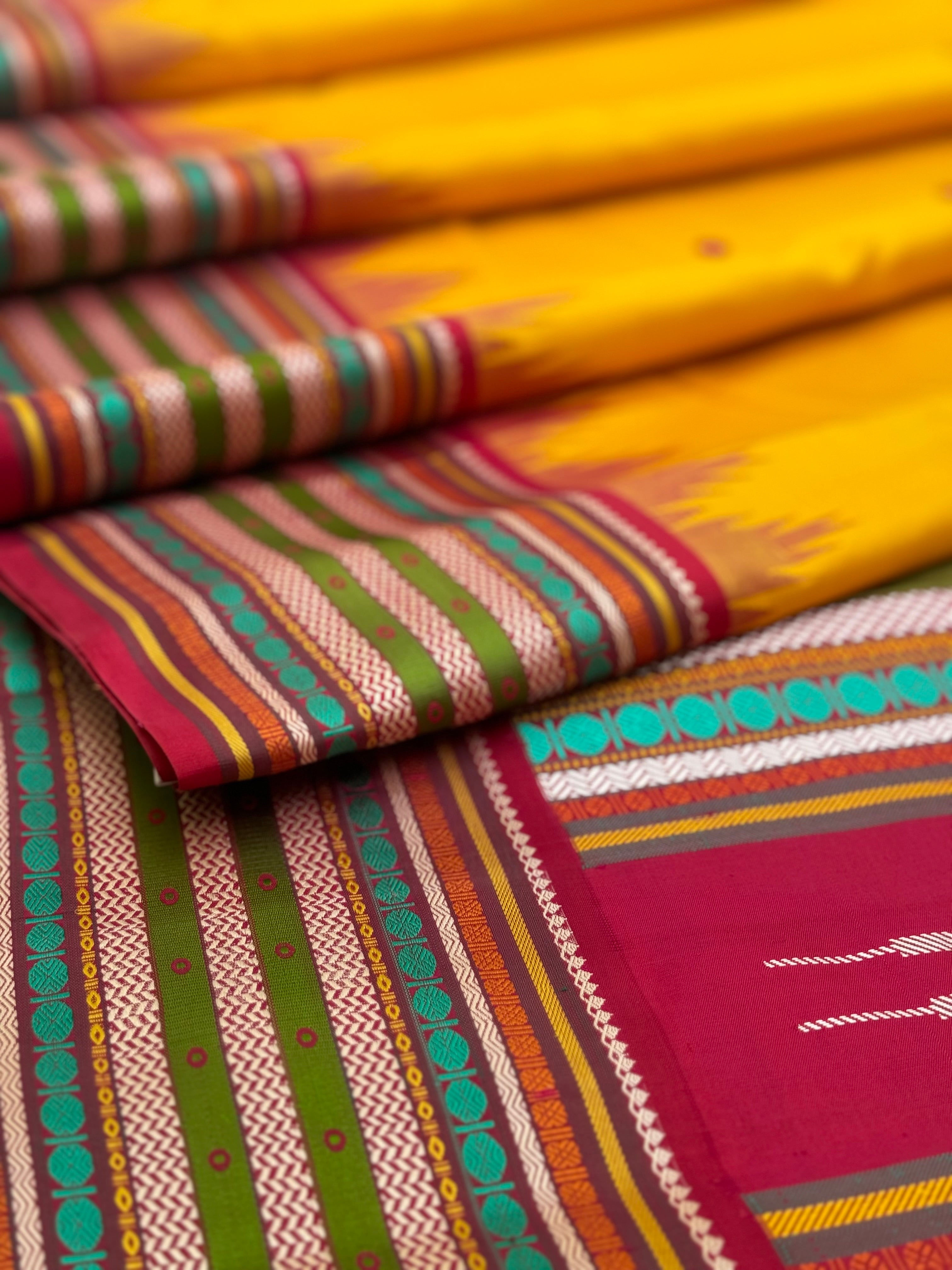 The stunner mango yellow with multicolour arakku korvai kanchivaram silk saree