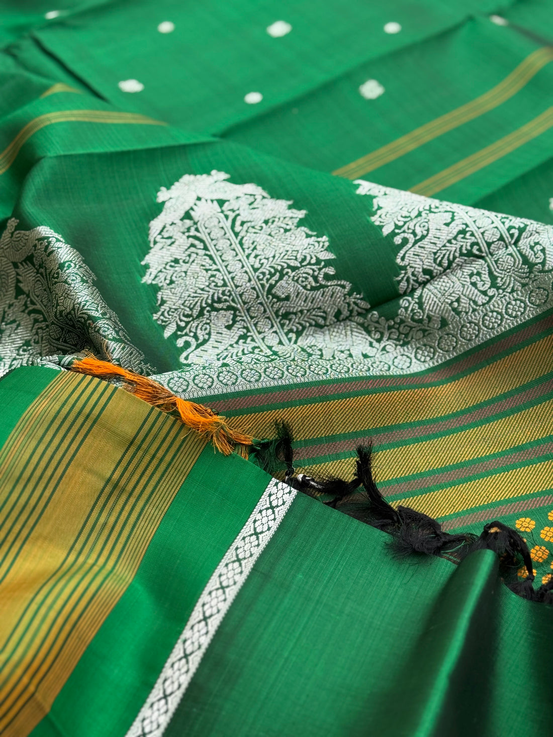 An elegant masterpiece forest green silver zari woven contemporary vanasingaram kanchivaram silk saree