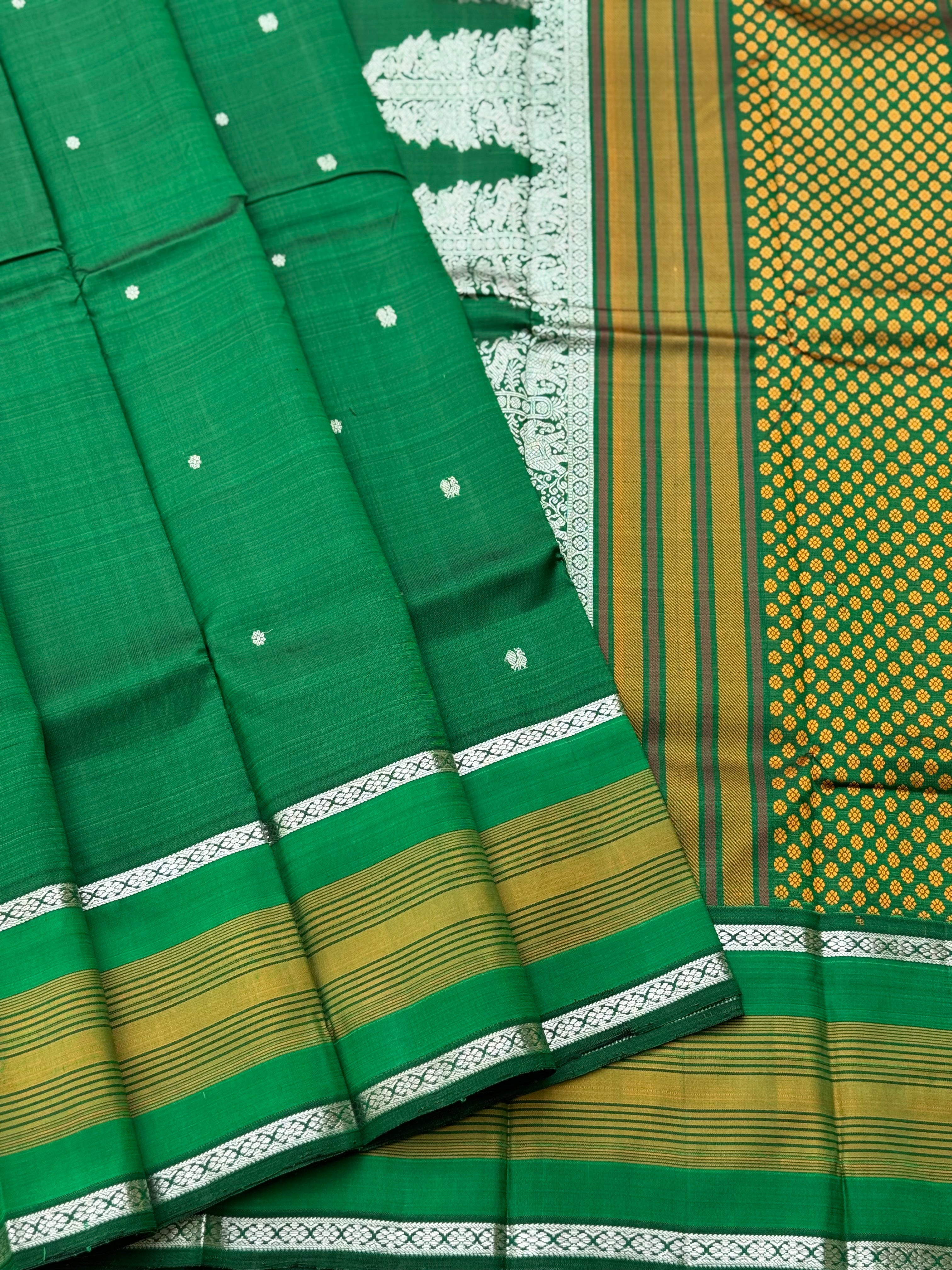 An elegant masterpiece forest green silver zari woven contemporary vanasingaram kanchivaram silk saree