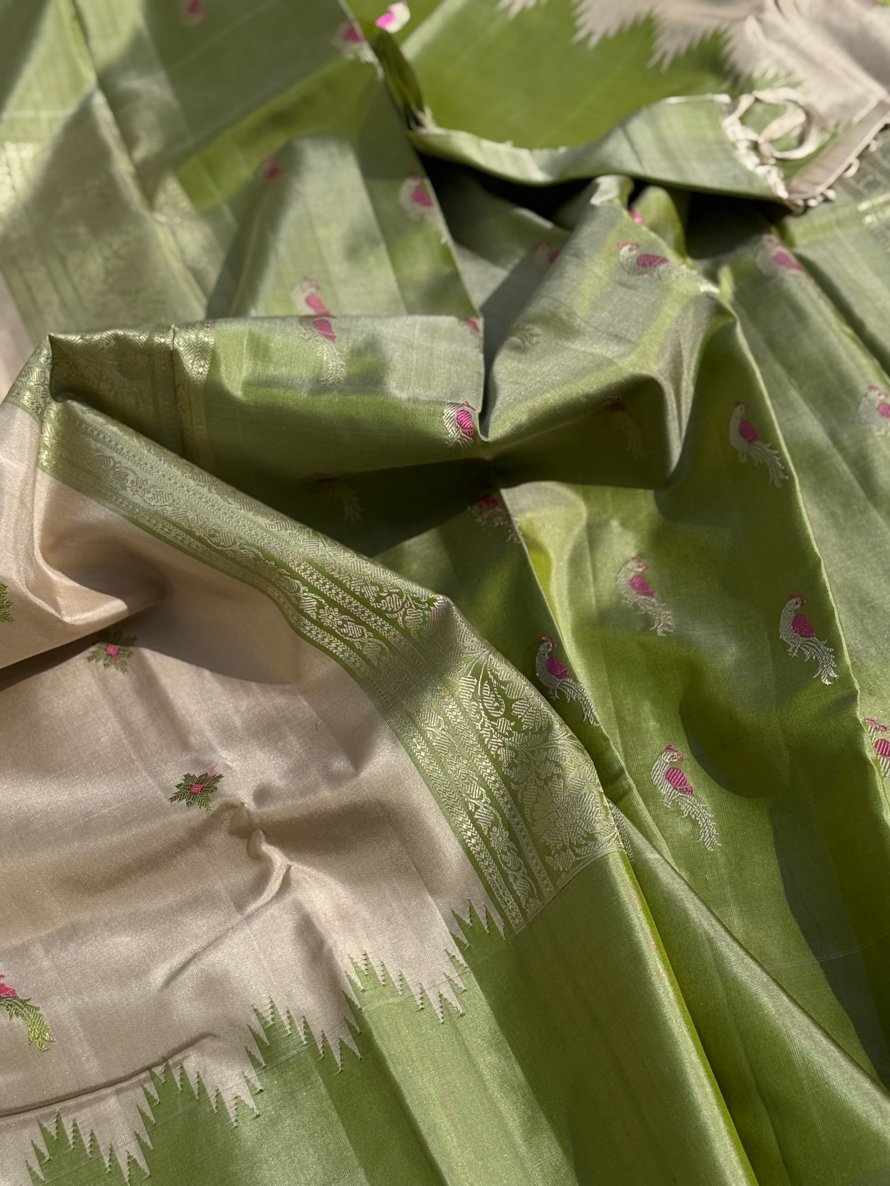 A gorgeous No Zari ivory with ivory and fern green handwoven soft and lustrous gadwal silk saree