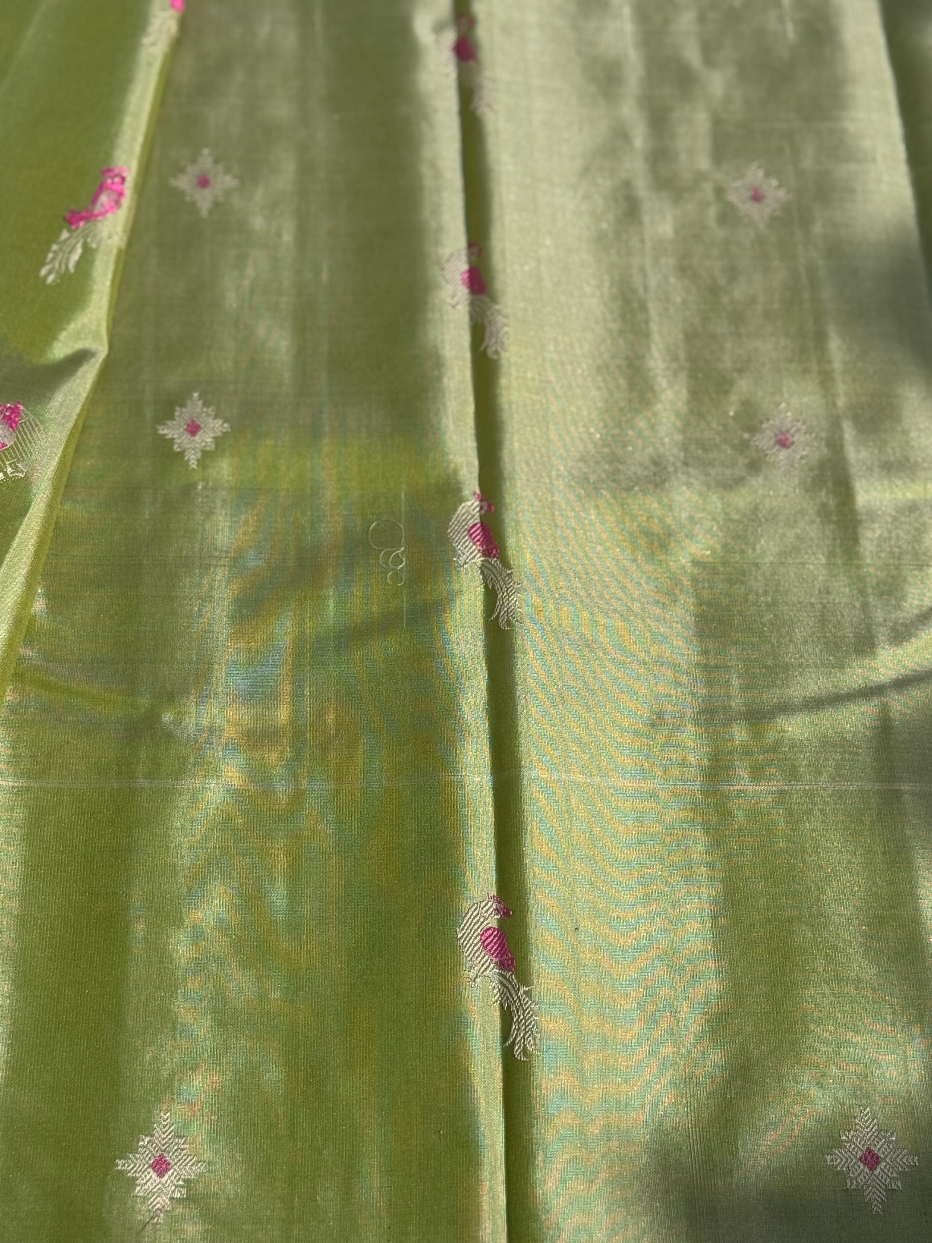 A gorgeous No Zari ivory with ivory and fern green handwoven soft and lustrous gadwal silk saree