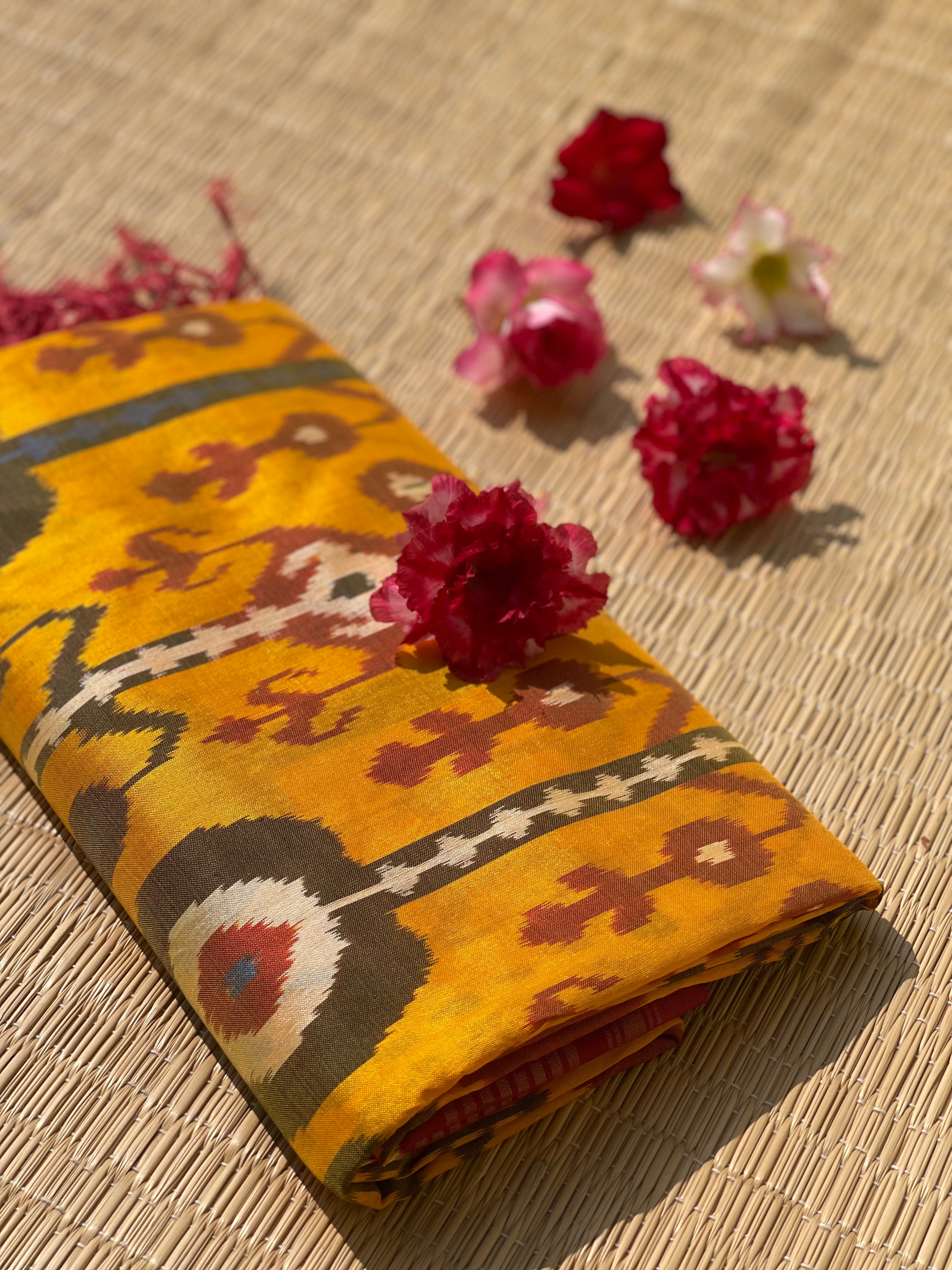 A stunner mustard yellow by deep burgundy premium tussar by mulberry silk ikkat SAREE
