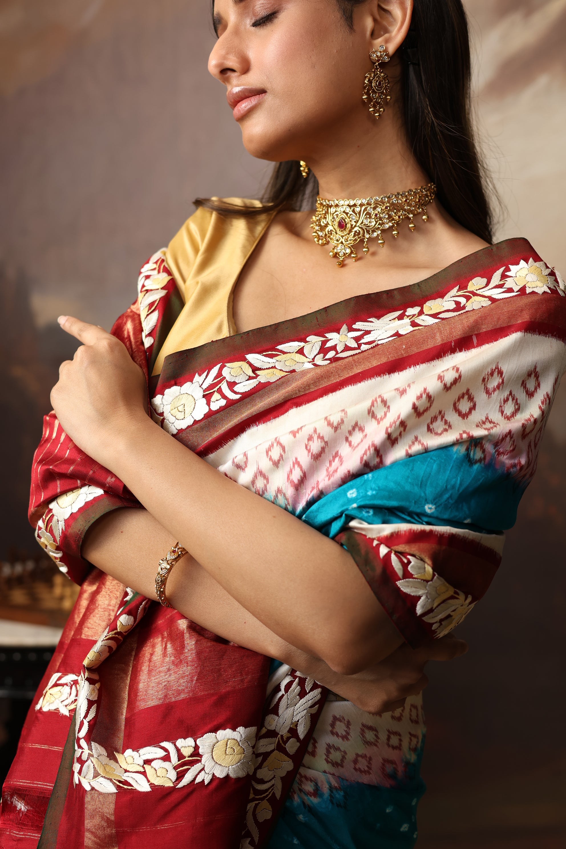 Gorgeous lotus ikkat silk saree with teal peacock blue Bhandej and Parsi gara hand embroidery