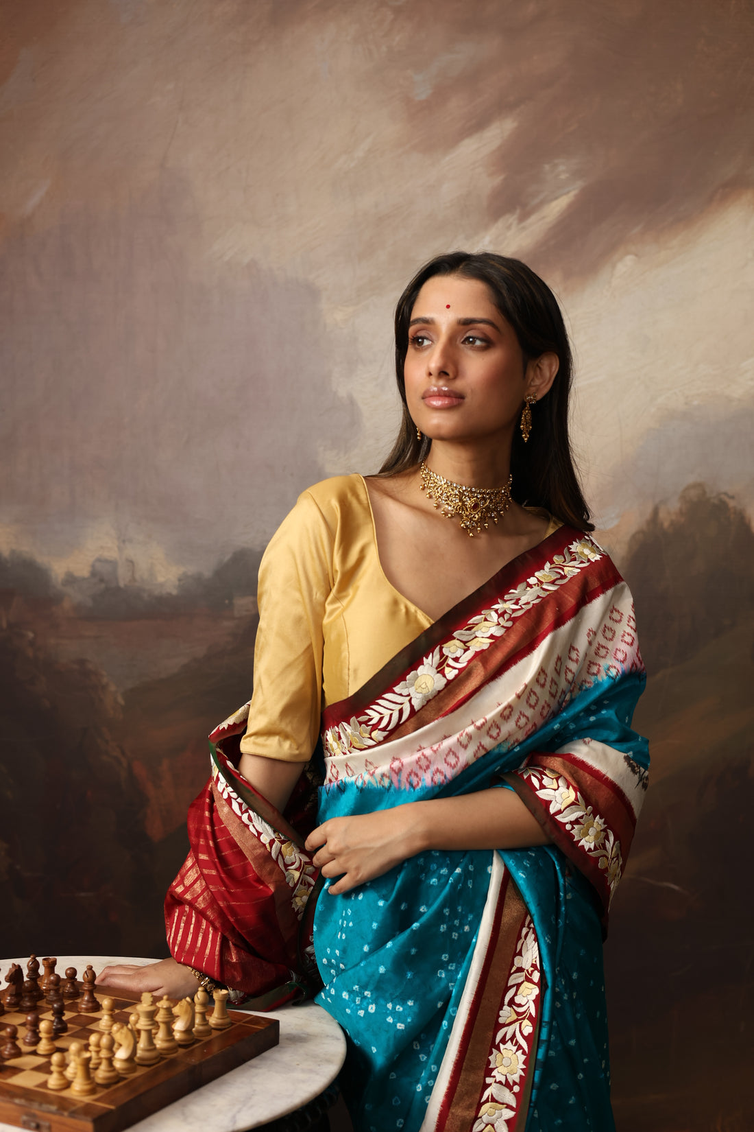 Gorgeous lotus ikkat silk saree with teal peacock blue Bhandej and Parsi gara hand embroidery