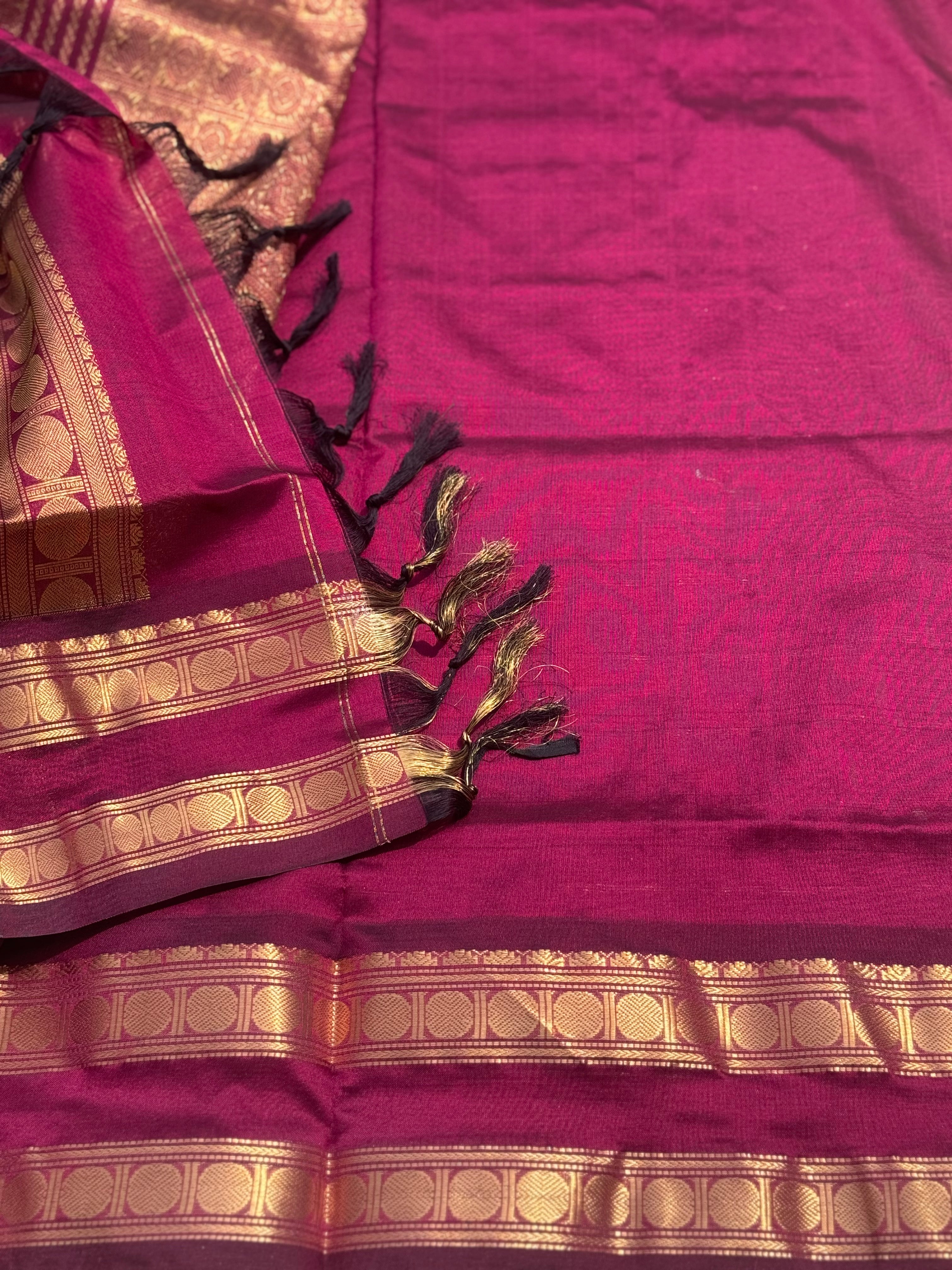 A gorgeous burgundy shade handwoven zari checks with deer motifs Kanchi silk cotton saree