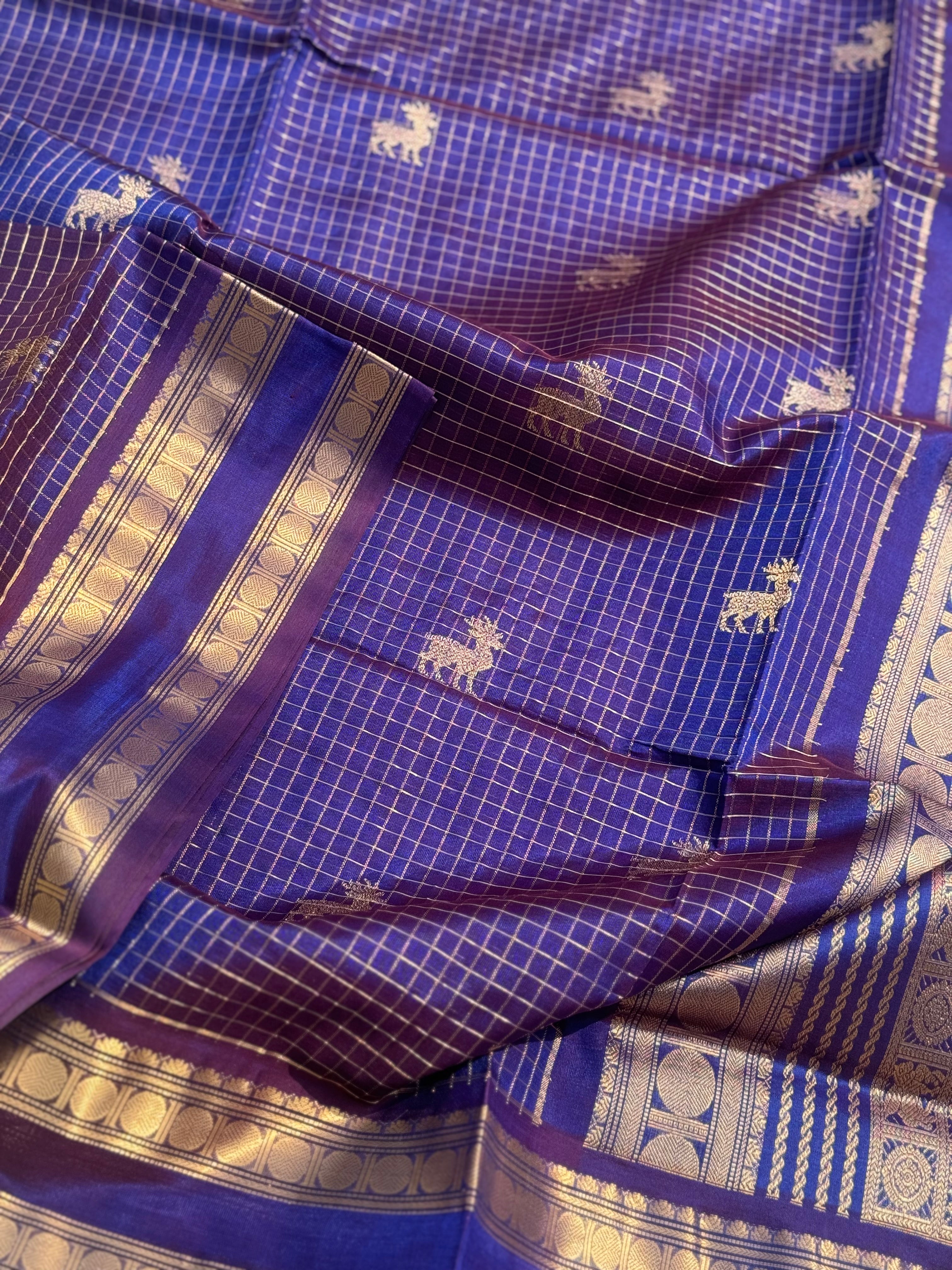 A gorgeous blue shade handwoven zari checks with deer motifs Kanchi silk cotton saree