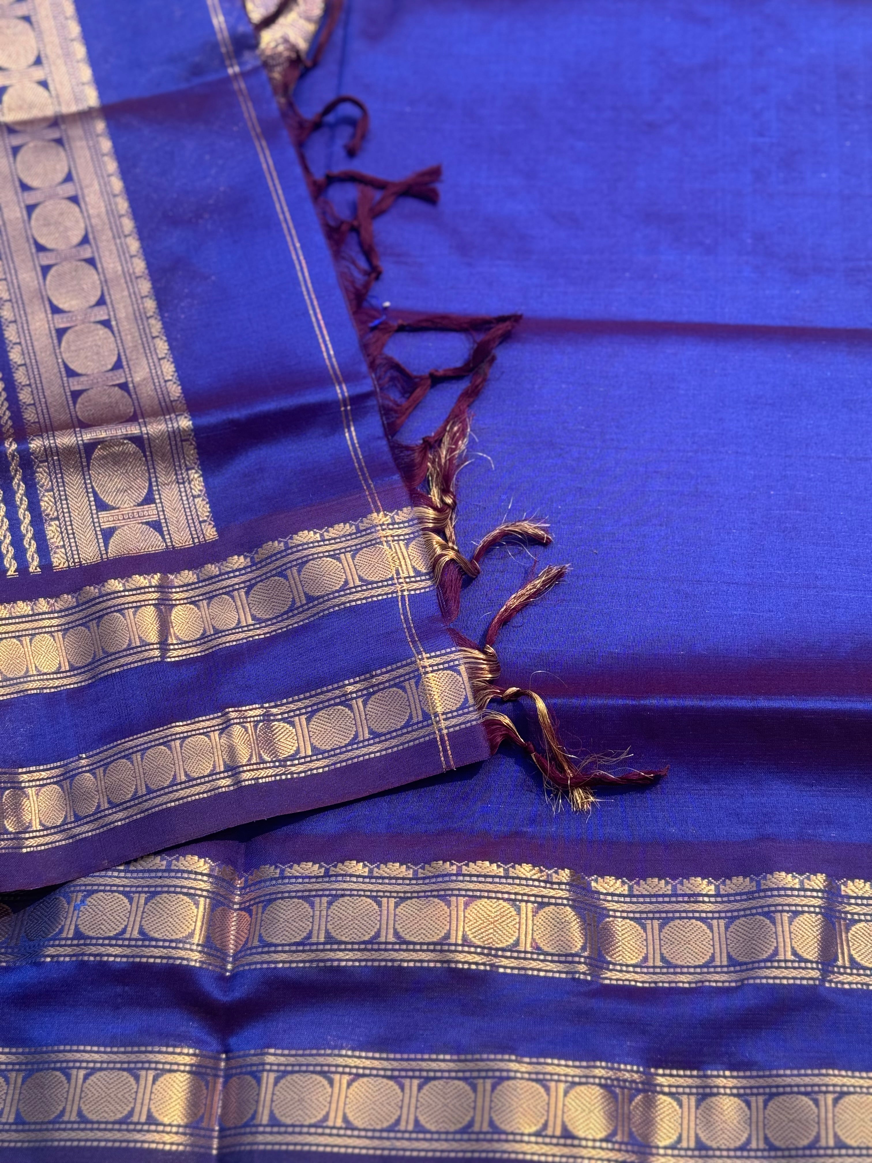 A gorgeous blue shade handwoven zari checks with deer motifs Kanchi silk cotton saree
