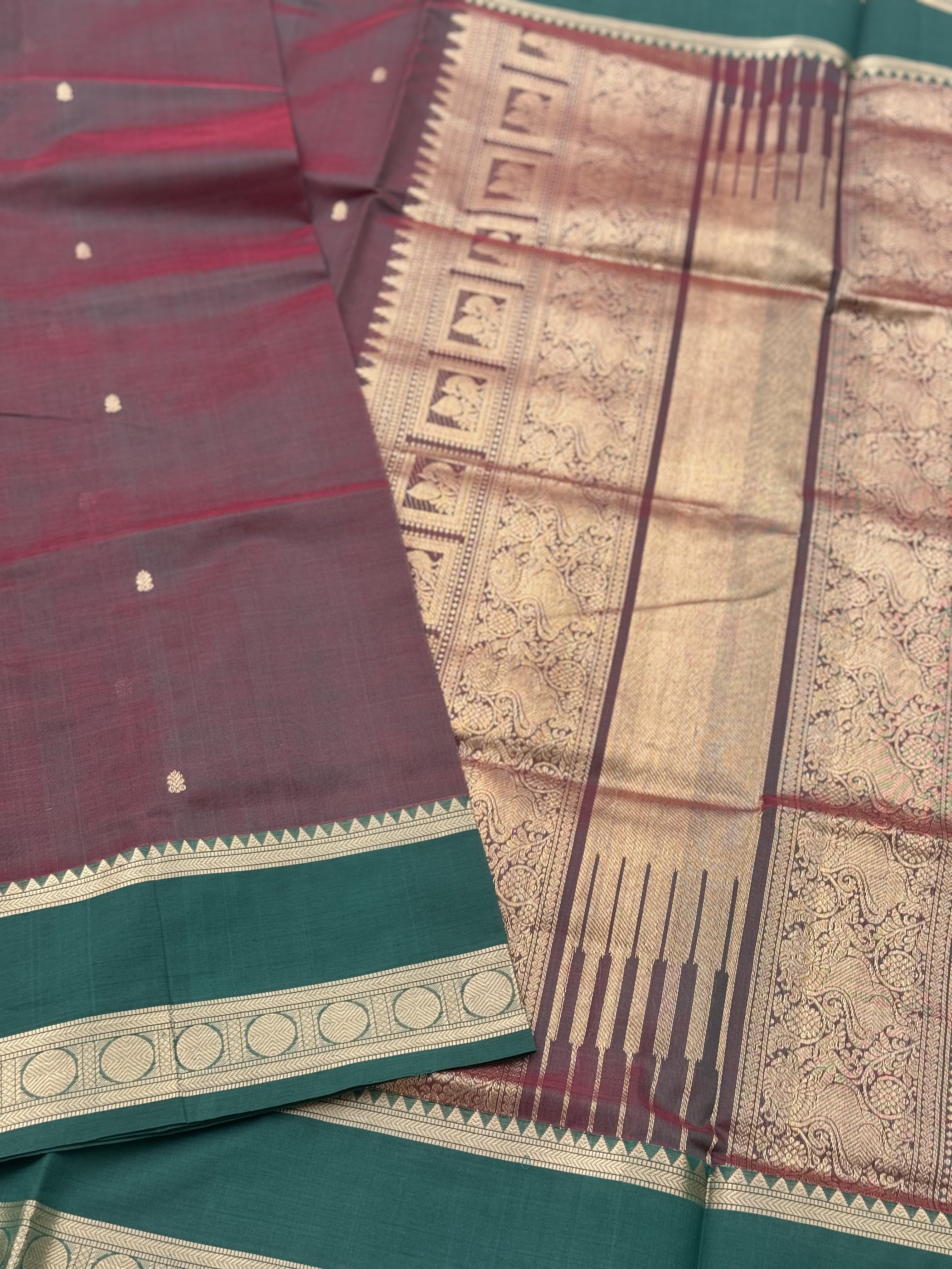 A gorgeous manthulir shade with arakku handwoven Kanchi silk cotton saree