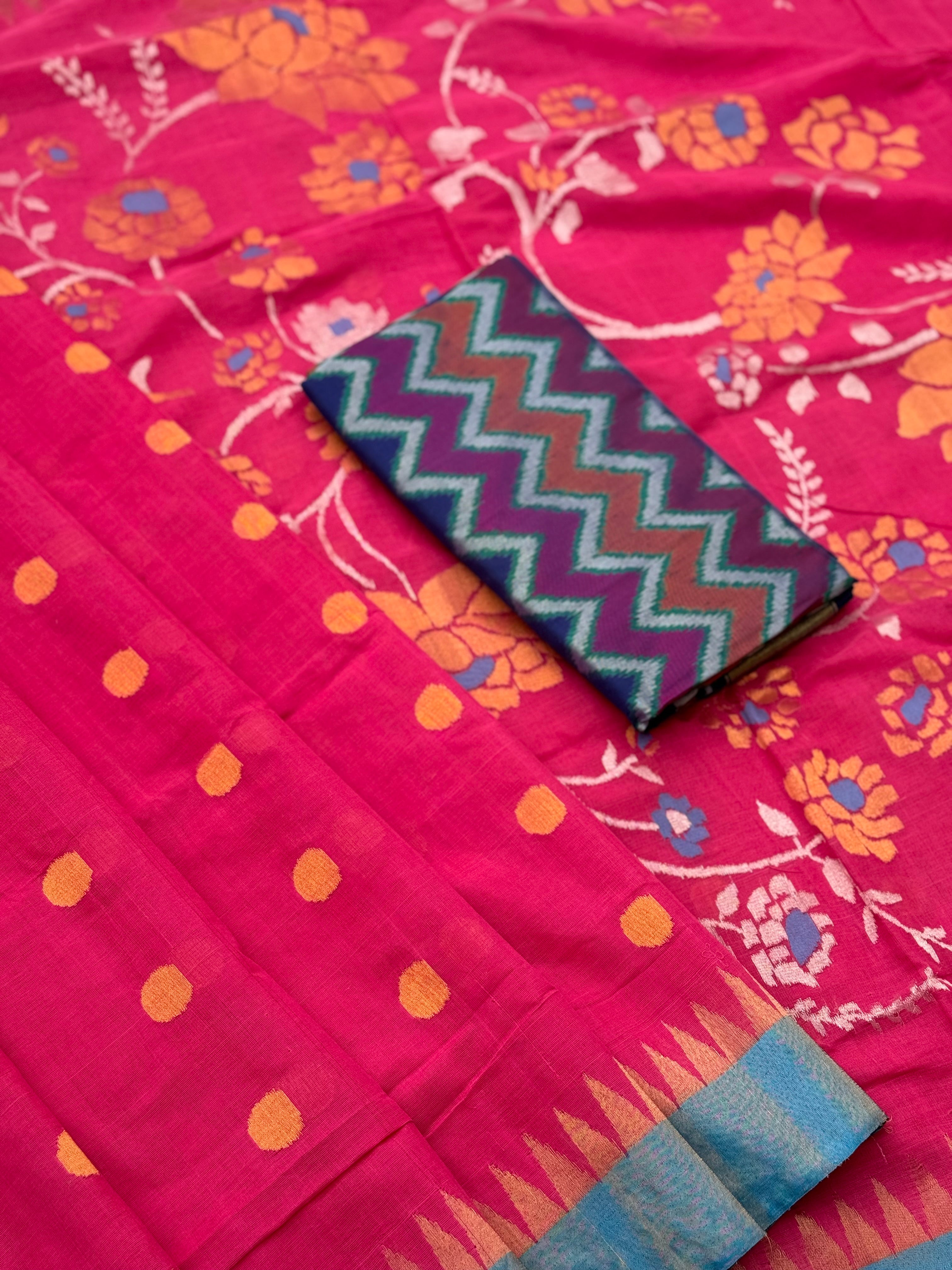 A gorgeous pink with blue Ponduru khadi Jaal jamdani saree