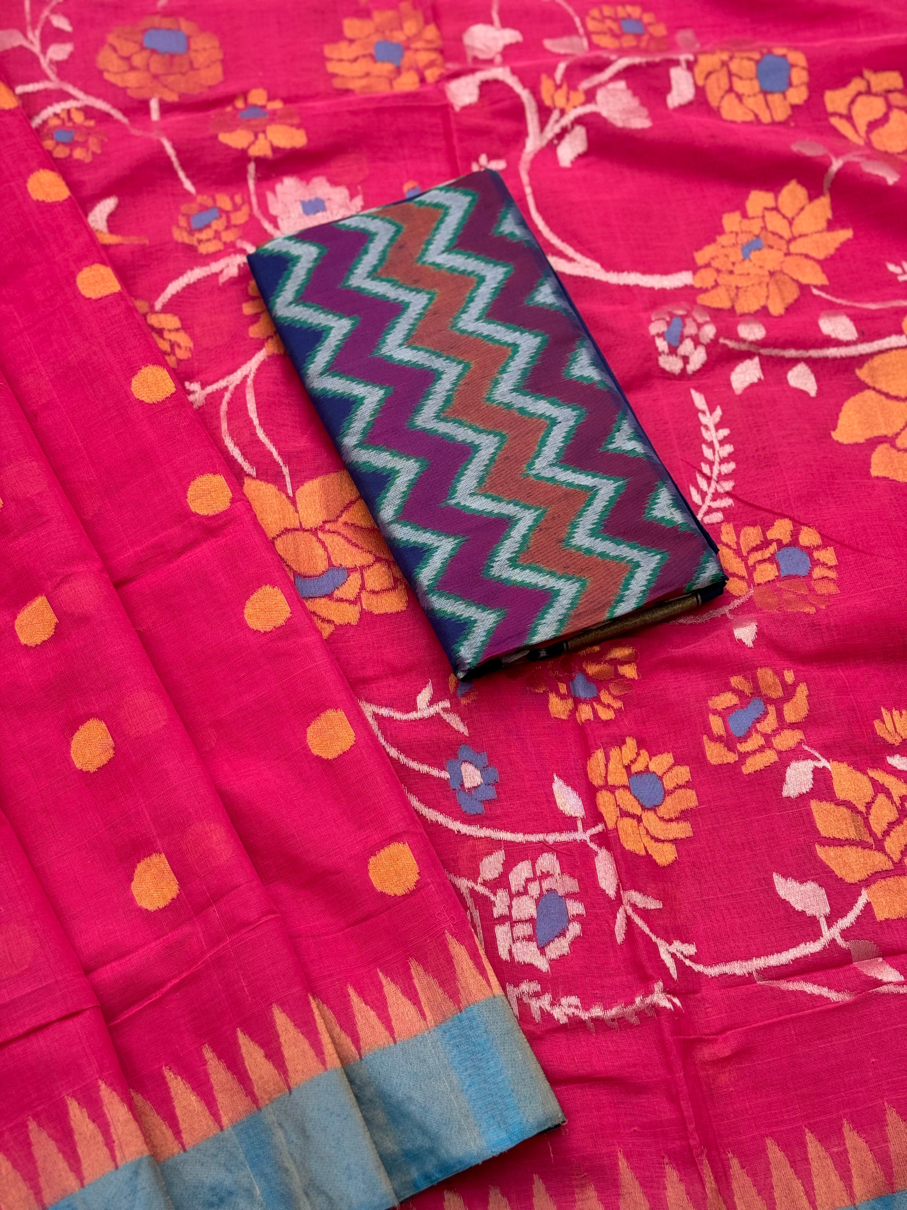 A gorgeous pink with blue Ponduru khadi Jaal jamdani saree