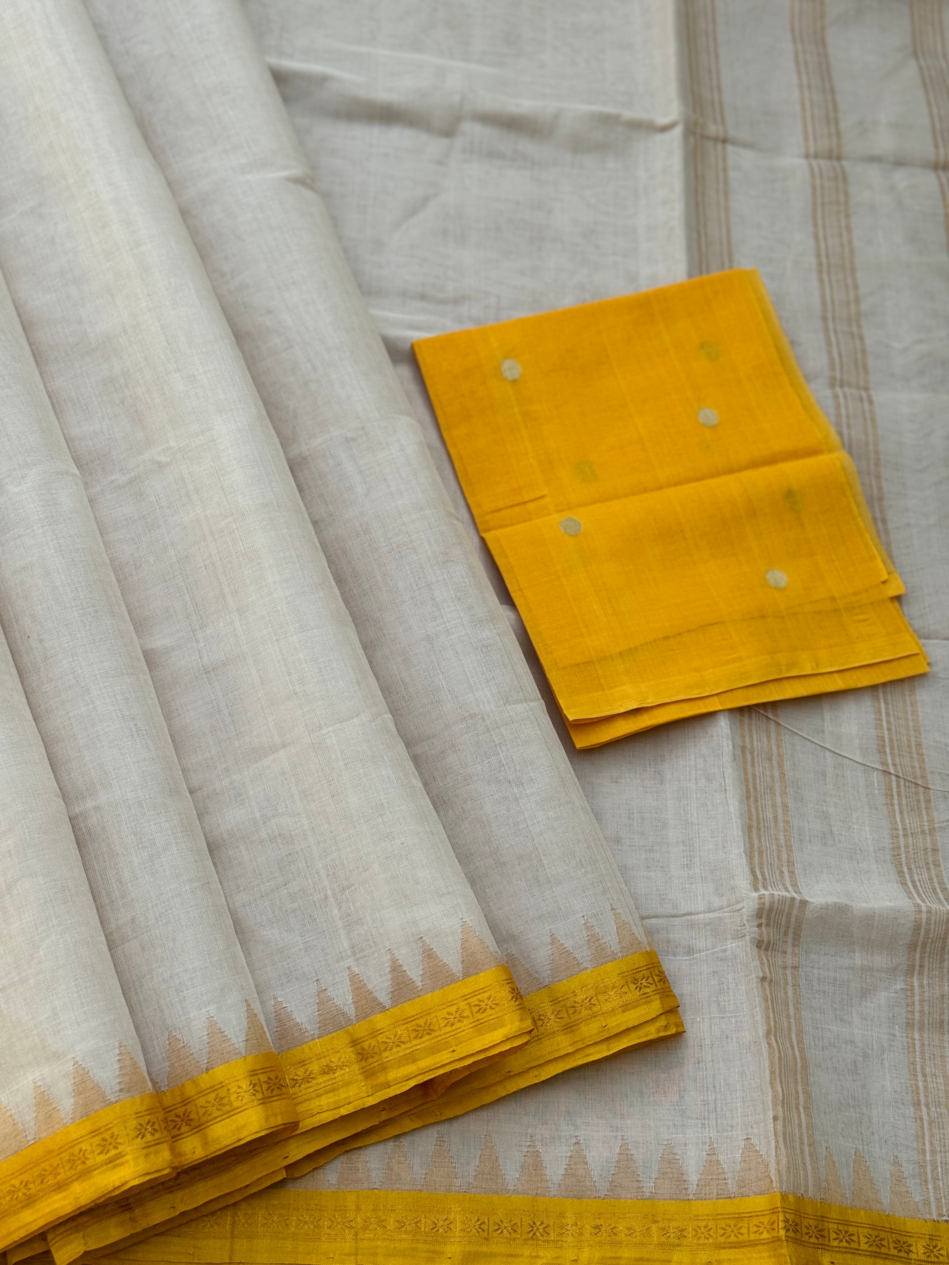 A subtle elegant ponduru Khadhi handspun with dobby silk border