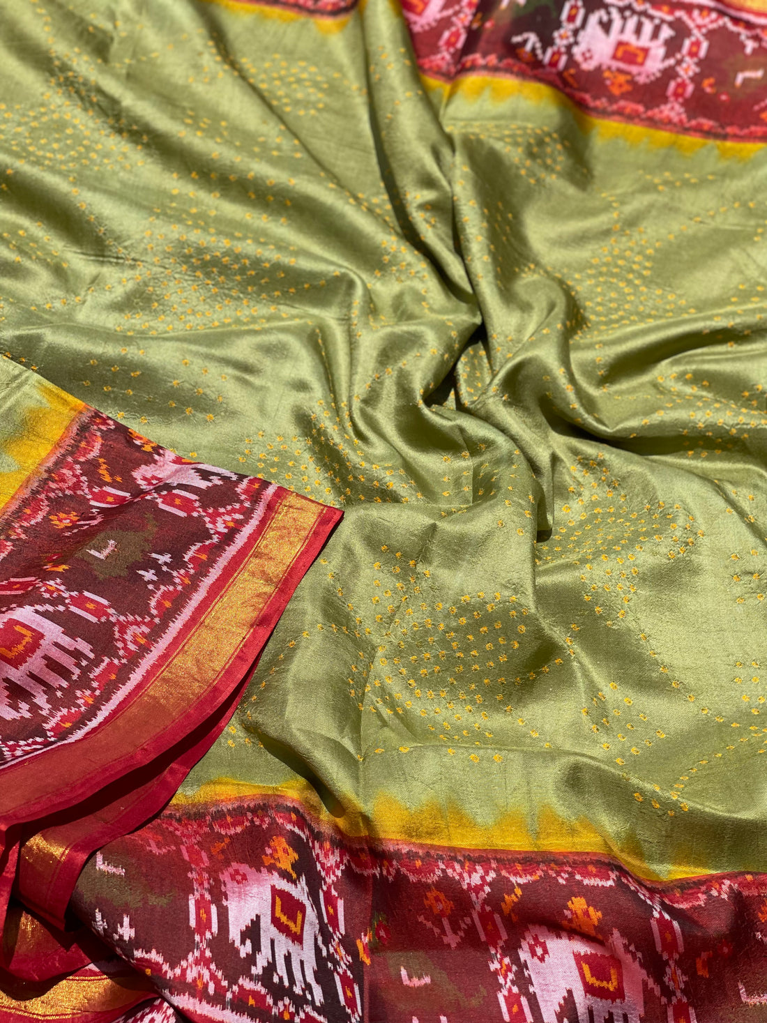 Hand knotted Rai Bhadhej Tie Dyed weft ikkat Rajkot silk saree on Moss green with yellow
