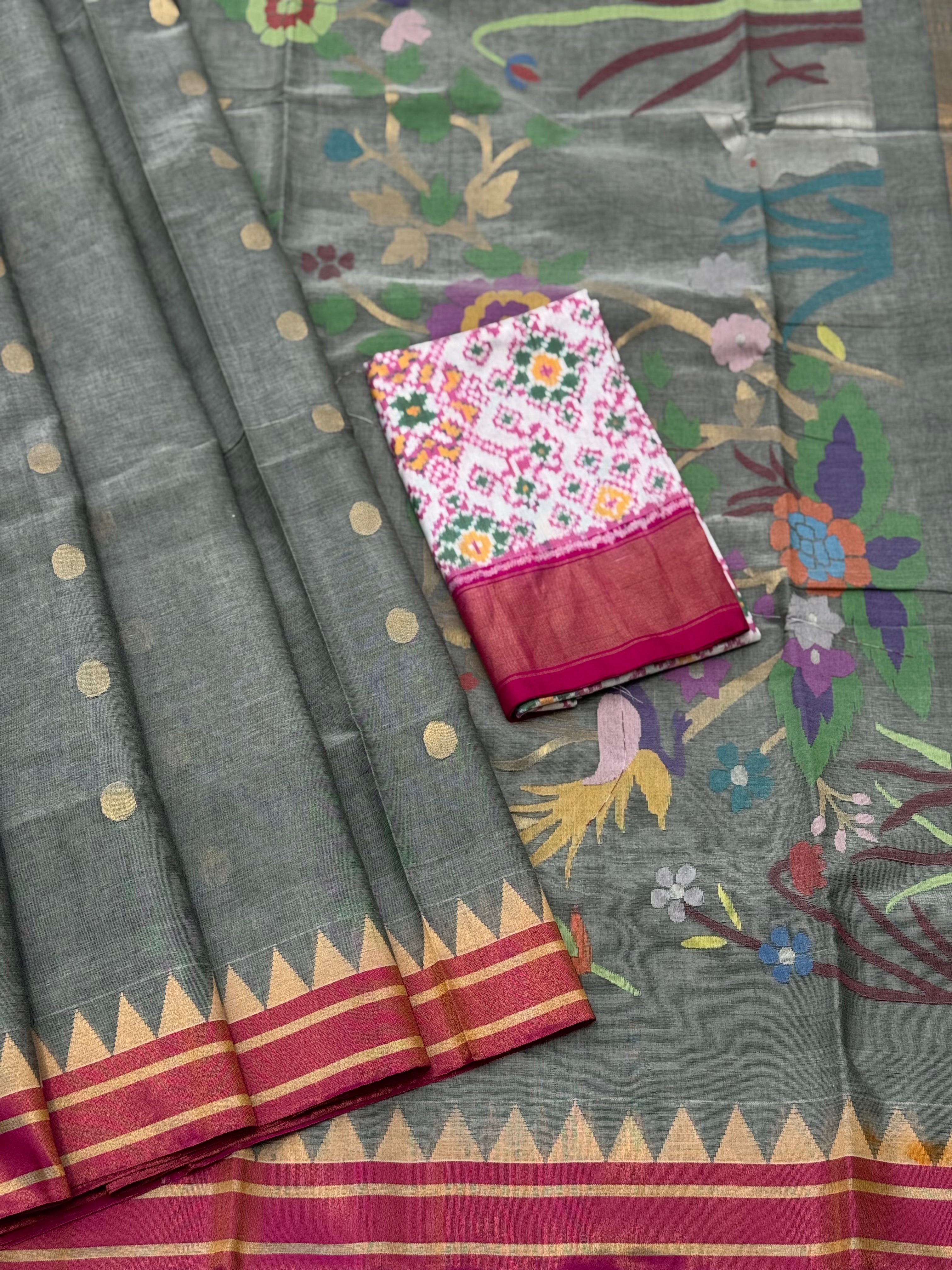 A gorgeous powder grey handspun ponduru Khadhi jamdani cotton saree