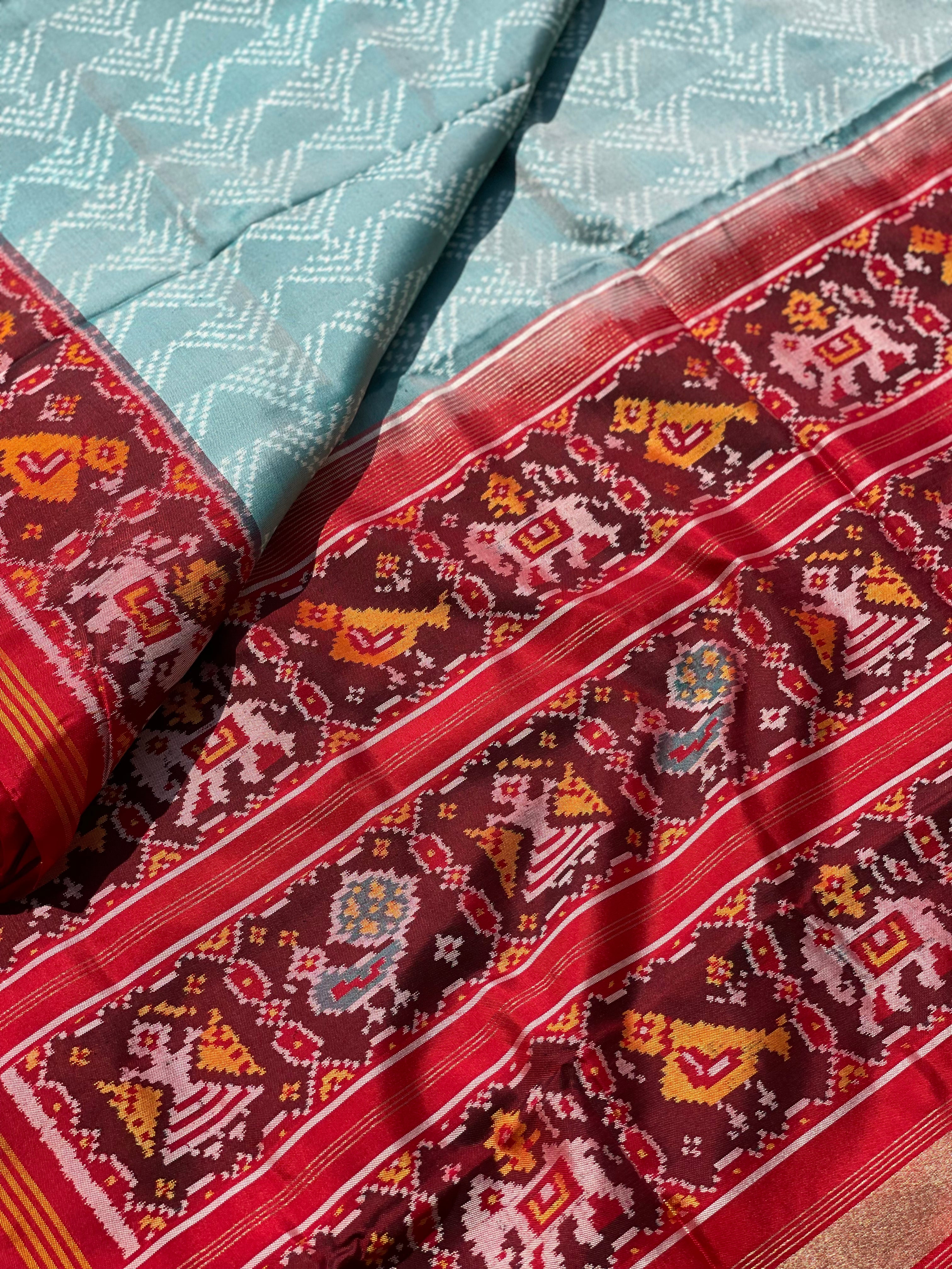 Cyan green Rajkot semi double ikkat Patola silk saree