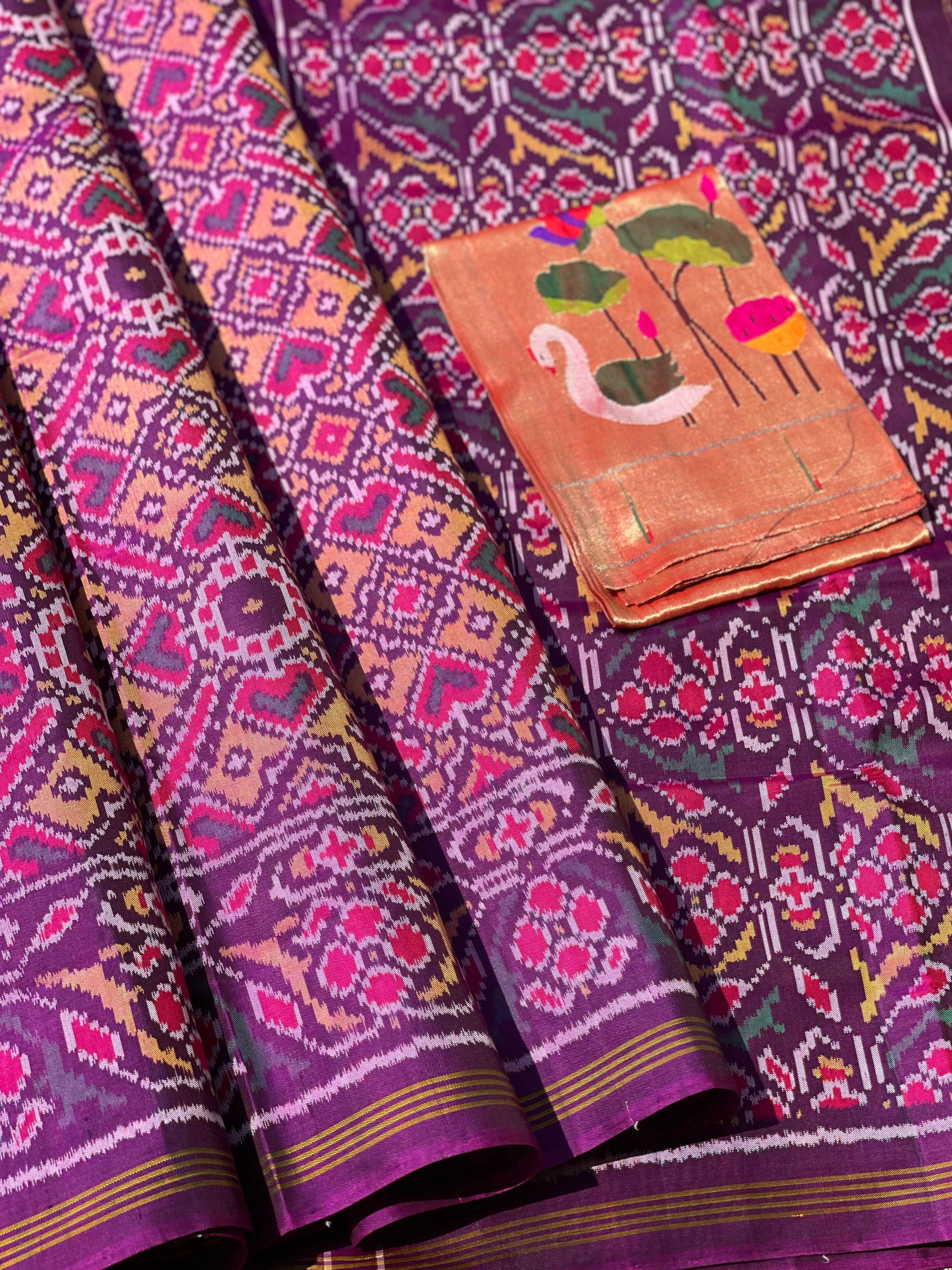 Purple shot with peach shade Rajkot semi double ikkat Patola silk saree