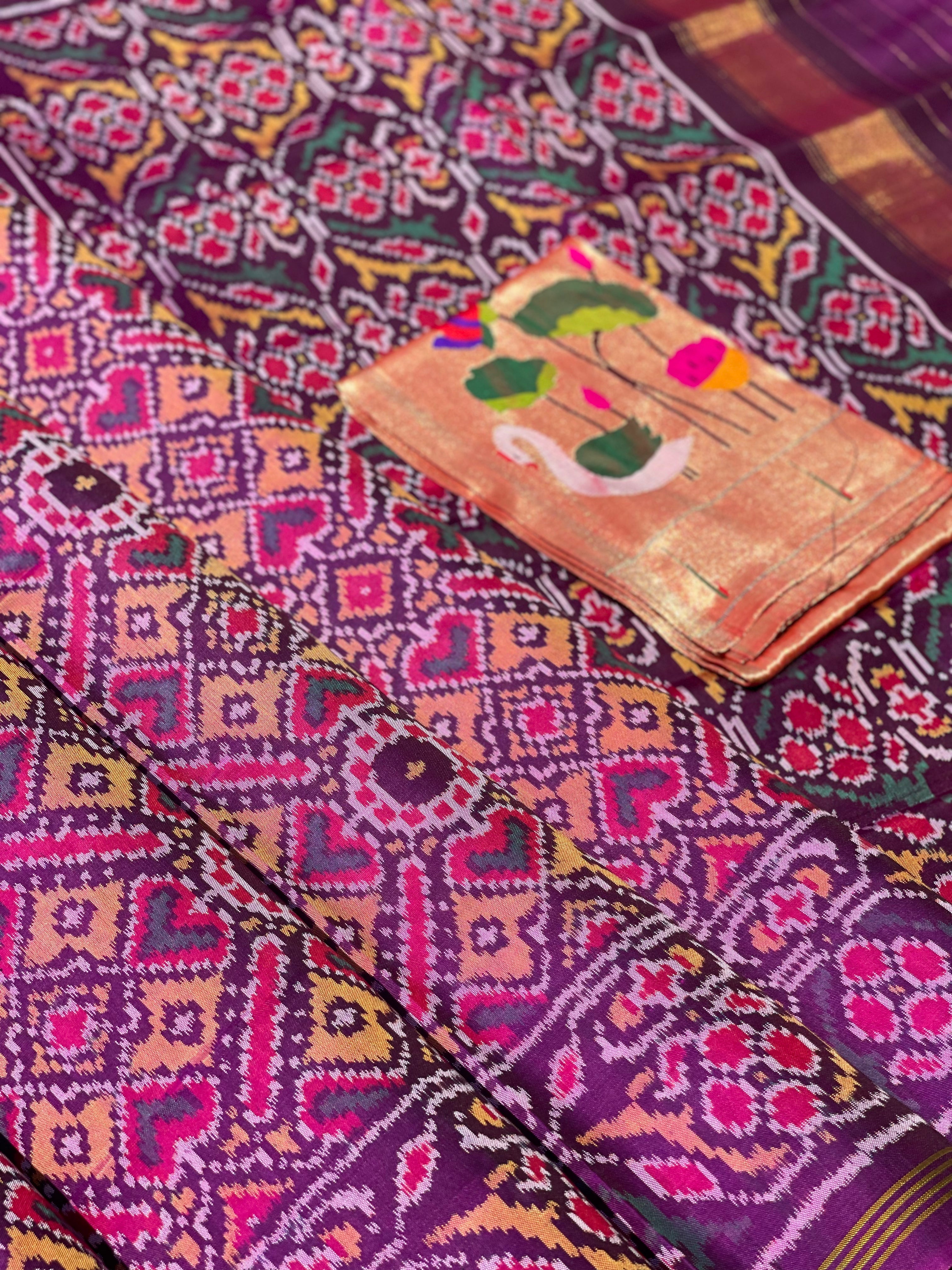 Purple shot with peach shade Rajkot semi double ikkat Patola silk saree