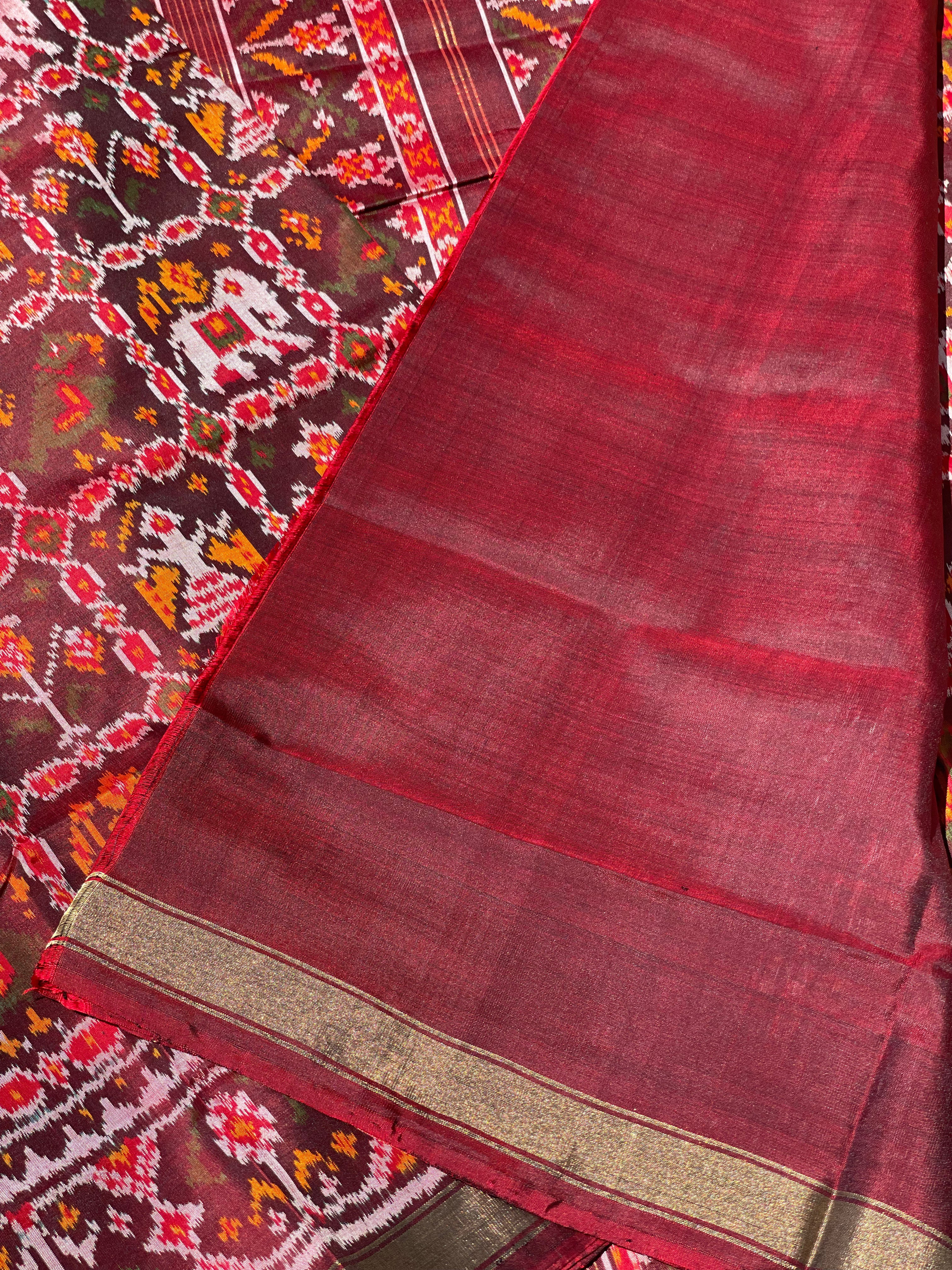 Deep burgundy Rajkot Patola Twill ikkat silk saree