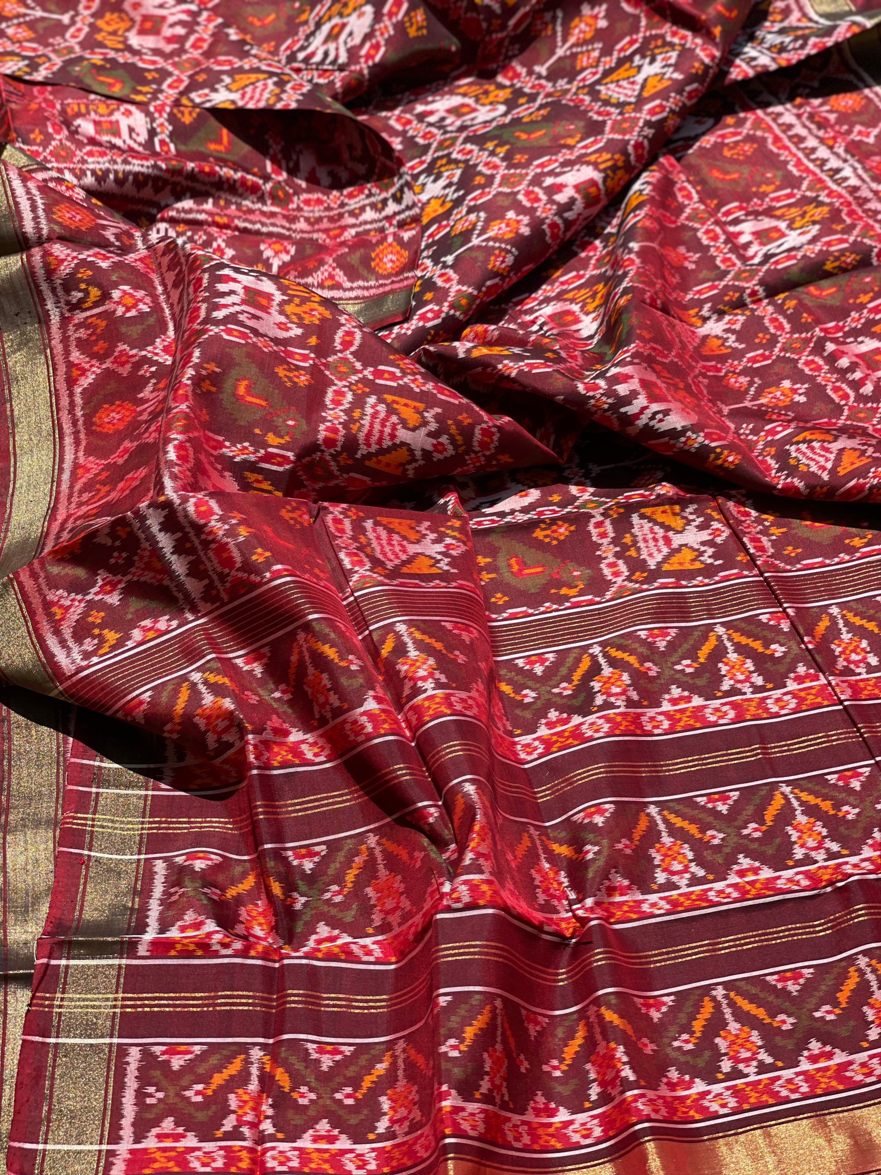 Deep burgundy Rajkot Patola Twill ikkat silk saree
